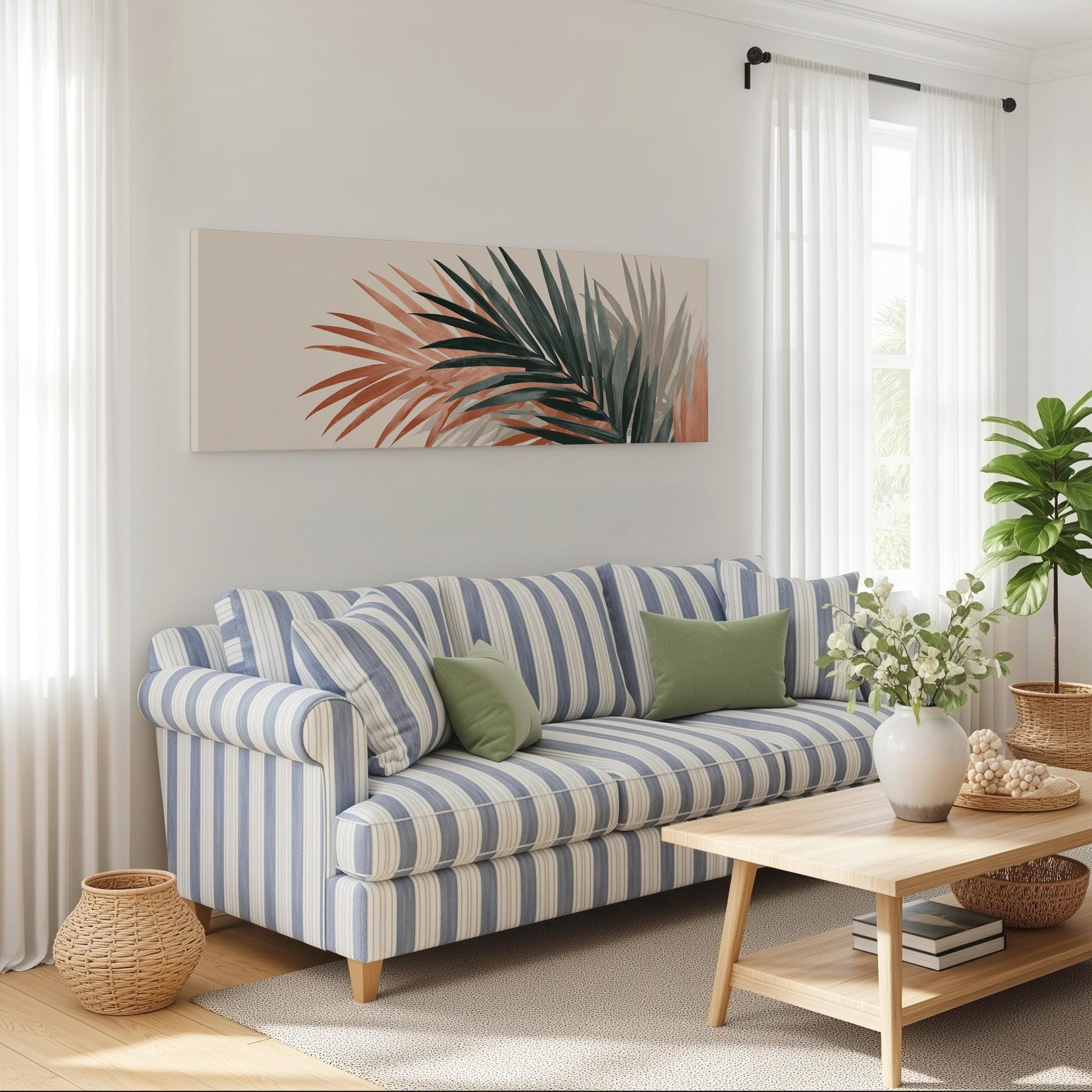 a cozy living room with a striped blue and white sofa, a wooden coffee table, and a large window with white curtains. A large abstract painting of palm leaves is hanging on the wall above the sofa, and a potted plant is placed on the coffee table.