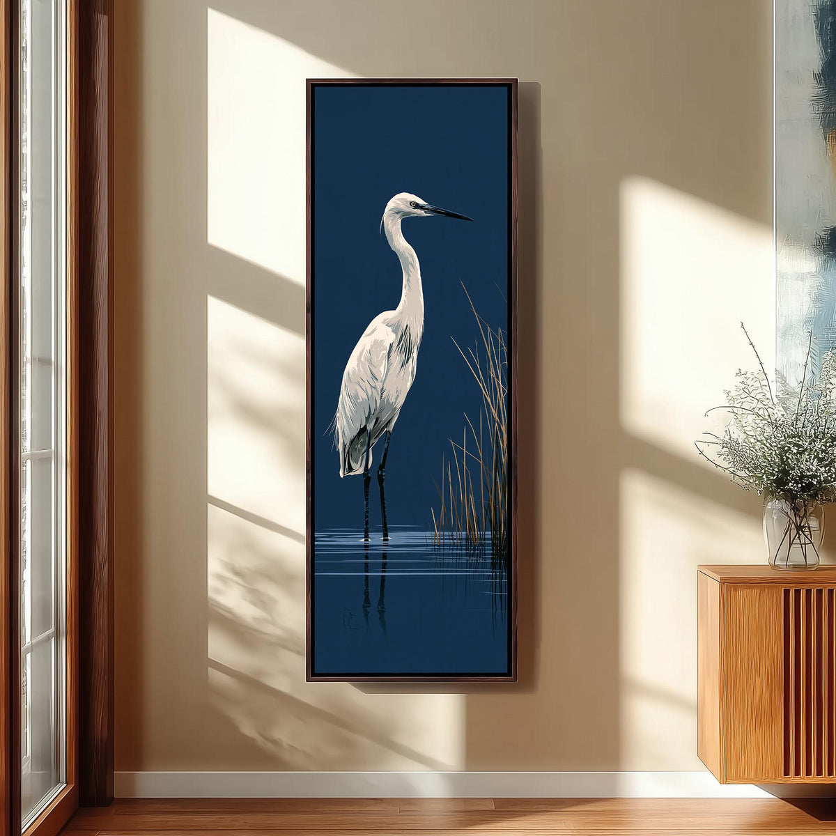 White egret wading on navy long vertical canvas print in a sunlit living space