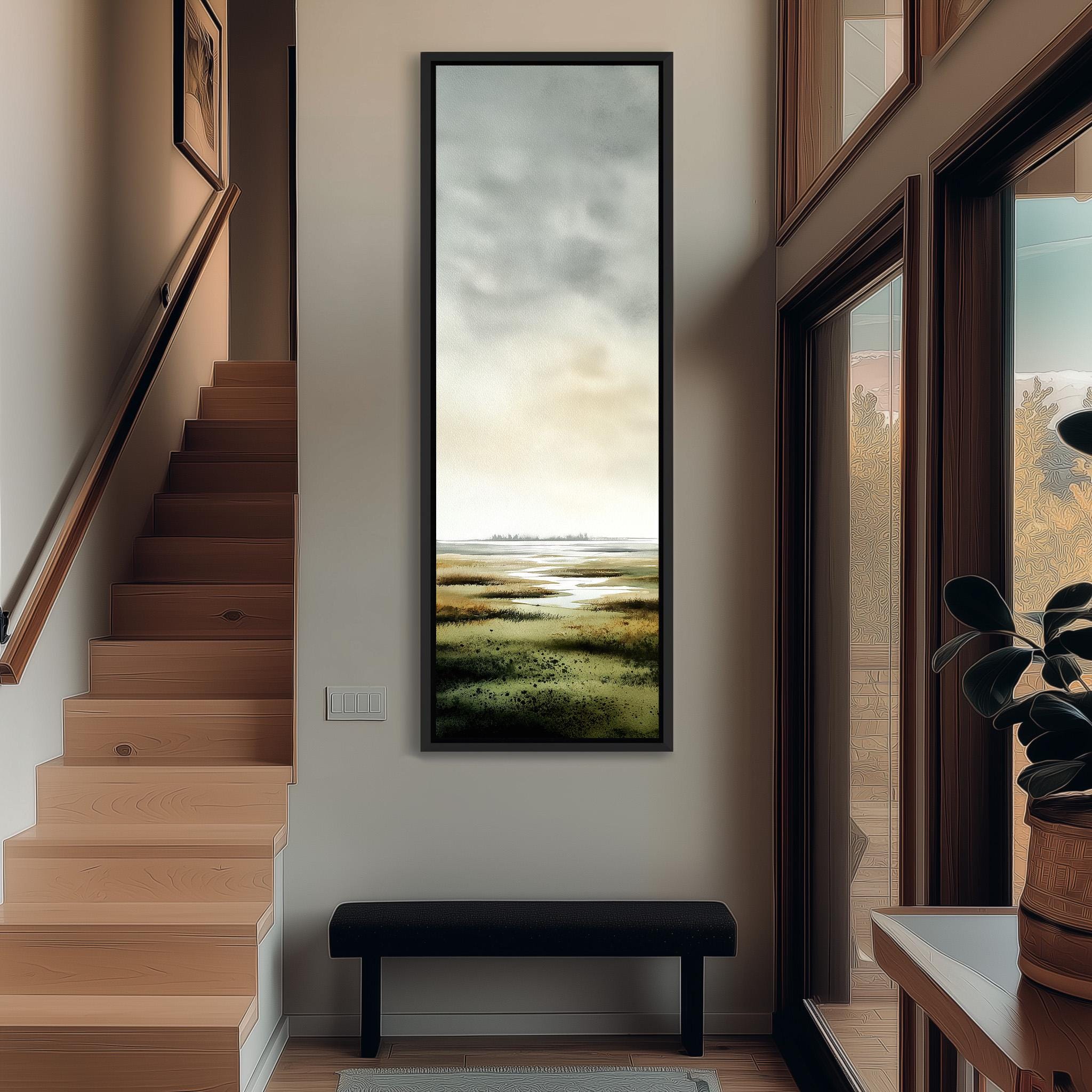 a hallway with a large painting of a landscape hanging on the wall, a wooden staircase, a bench, and a plant in a pot.