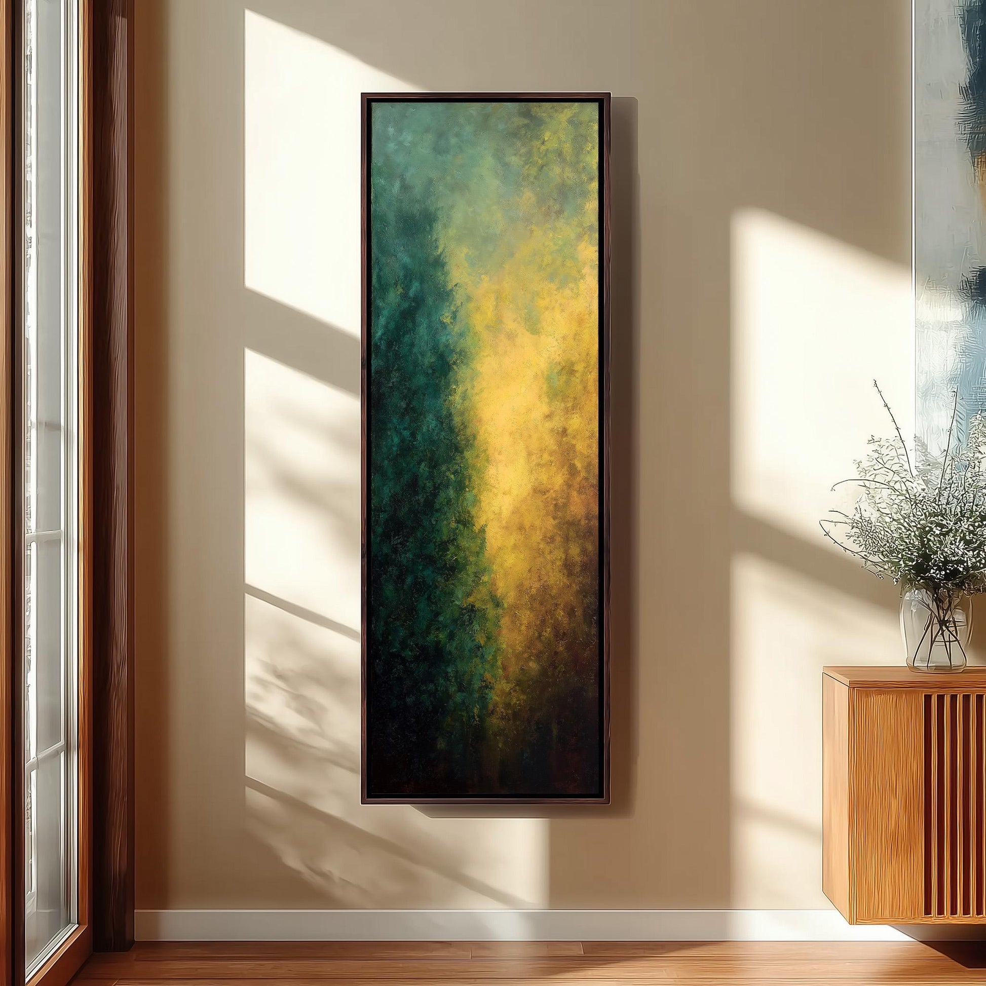 a large, colorful painting hanging on a wall in a room with a wooden floor and a window.
