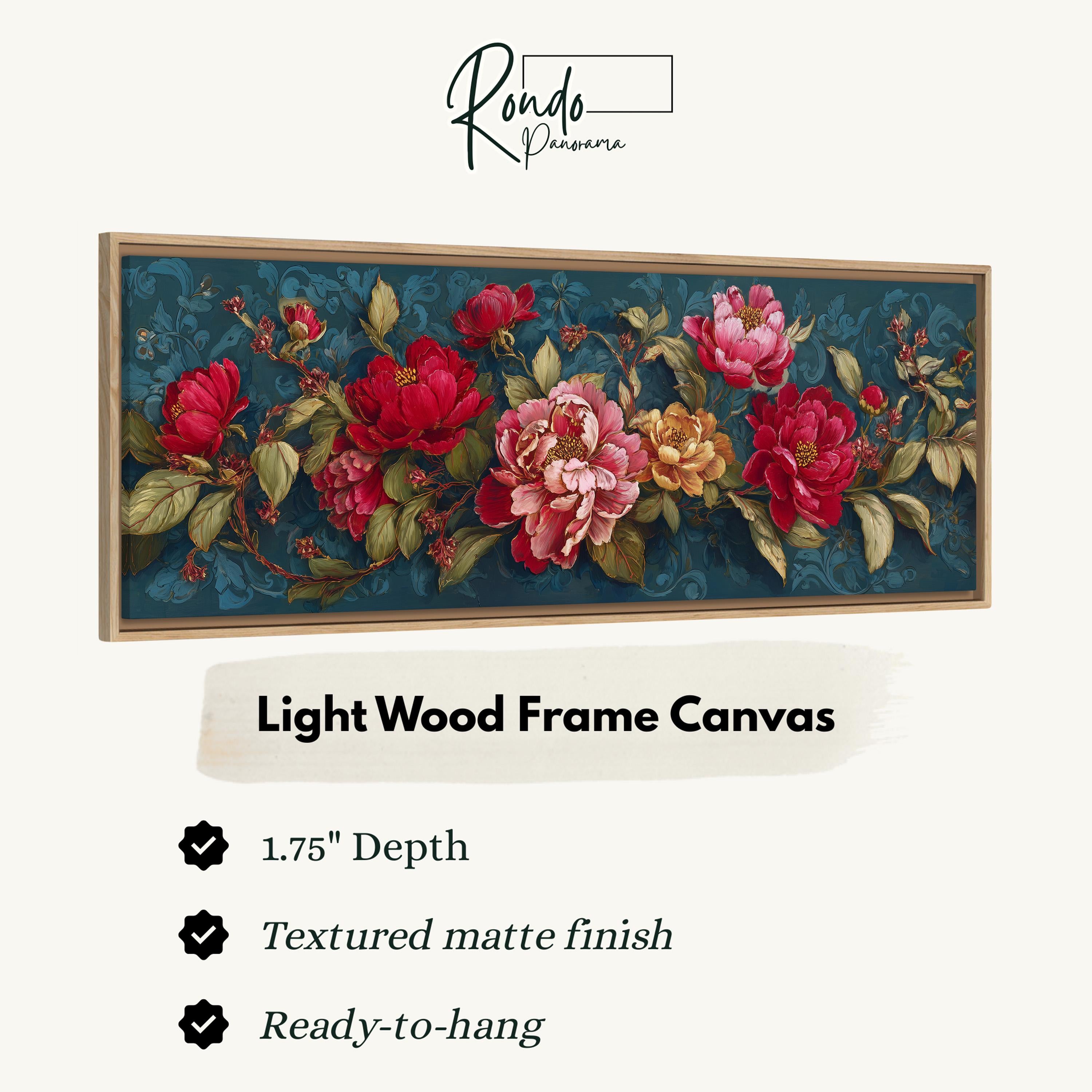 a light wood frame canvas with a floral design of red and pink flowers against a dark blue background.