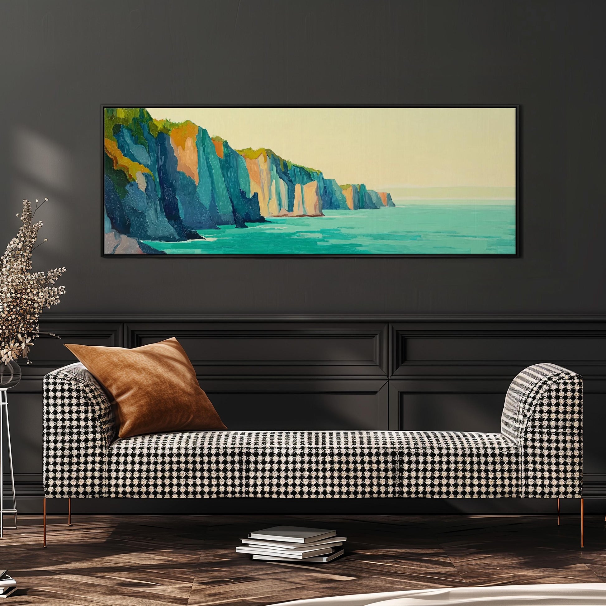 a large, colorful painting of a cliff overlooking the ocean, hanging on a wall above a black and white checkered sofa.