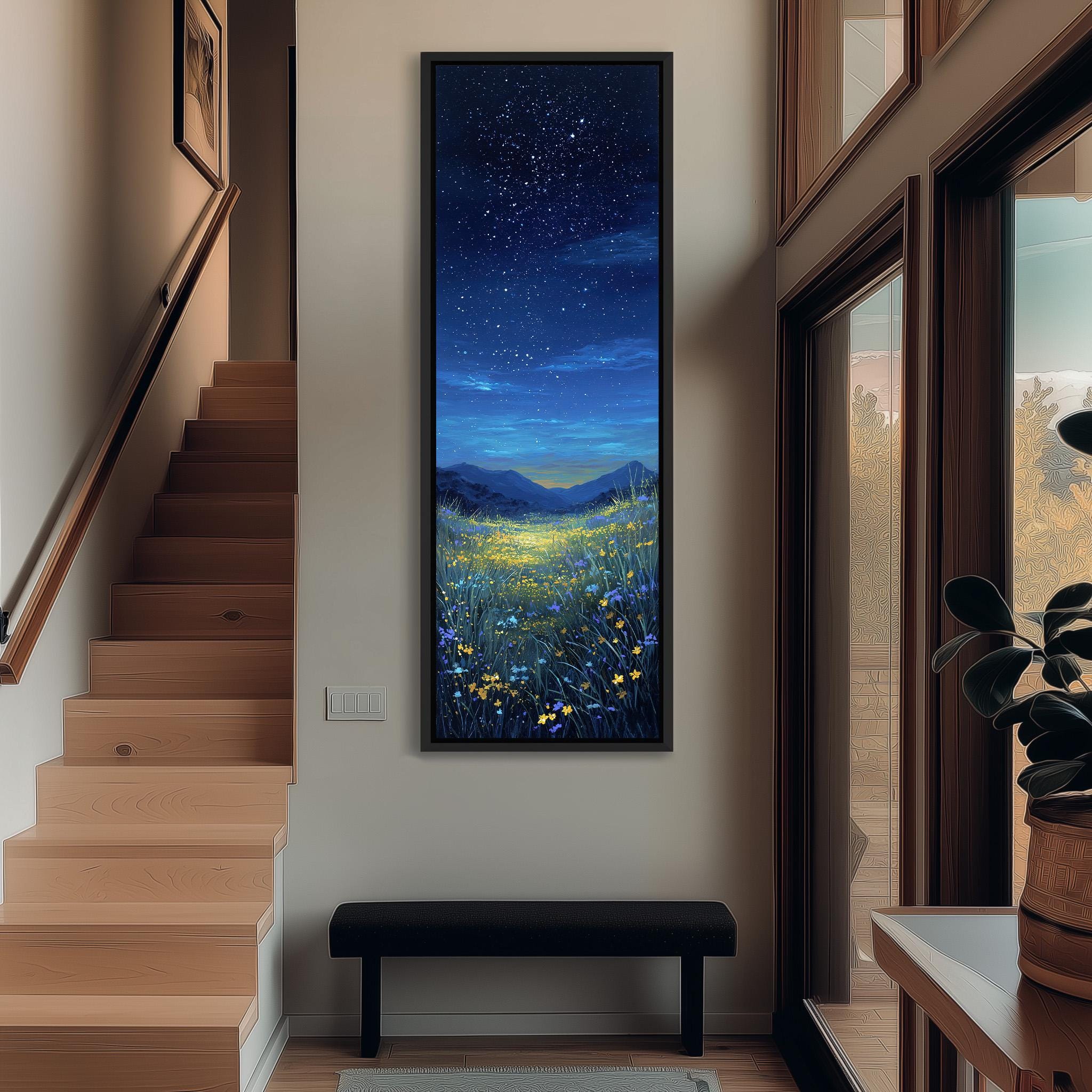 a large painting of a night sky with stars and a field of flowers, hanging on the wall of a hallway.