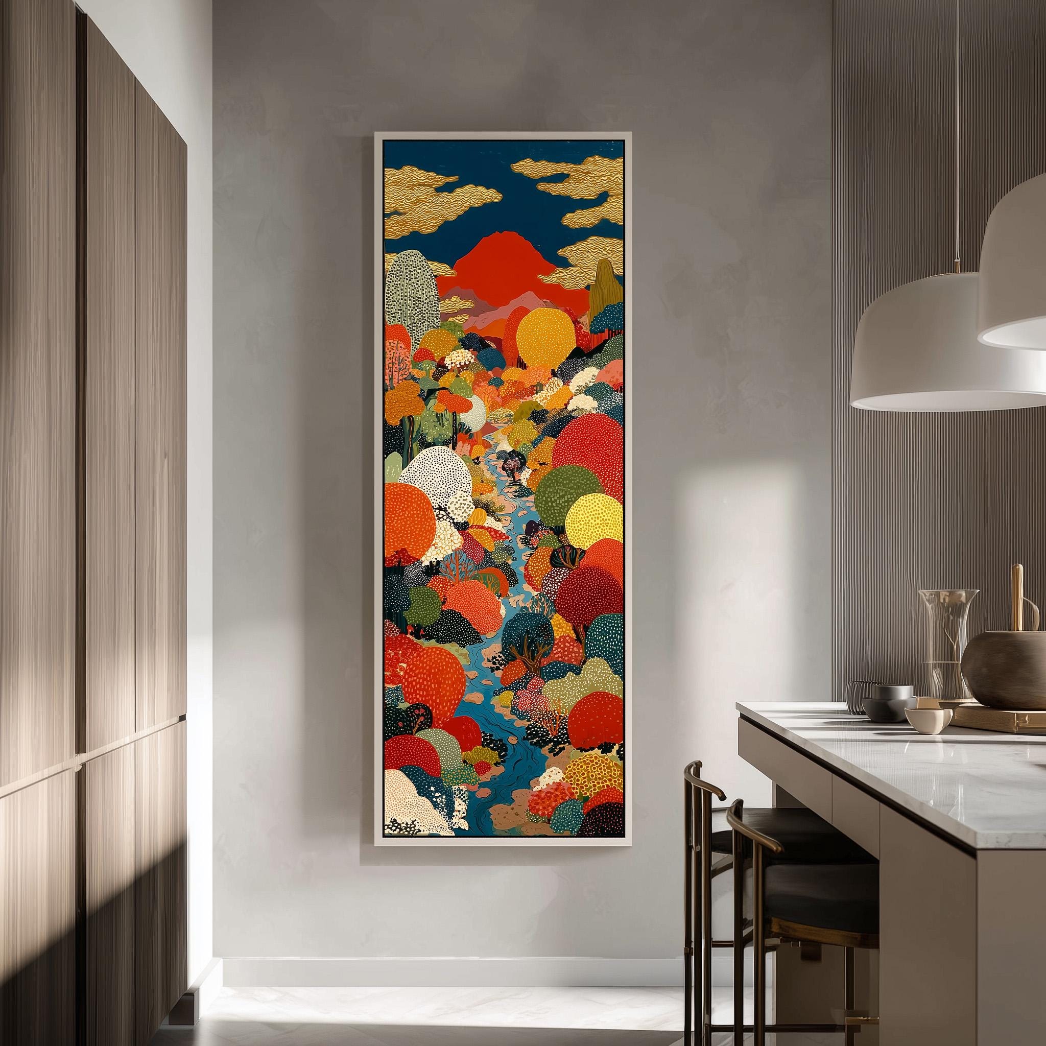 a large, colorful painting hanging on a wall in a modern kitchen.