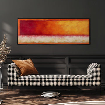 a modern living room with a black and white checkered sofa, a large abstract painting on the wall, and a stack of books on the floor.