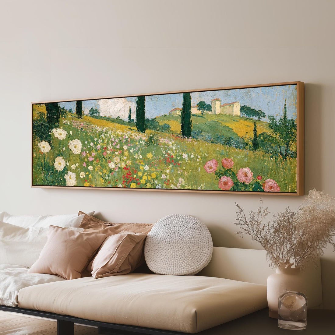 Tuscan wildflower hillside with cypress trees long horizontal canvas print above a sofa in a living room