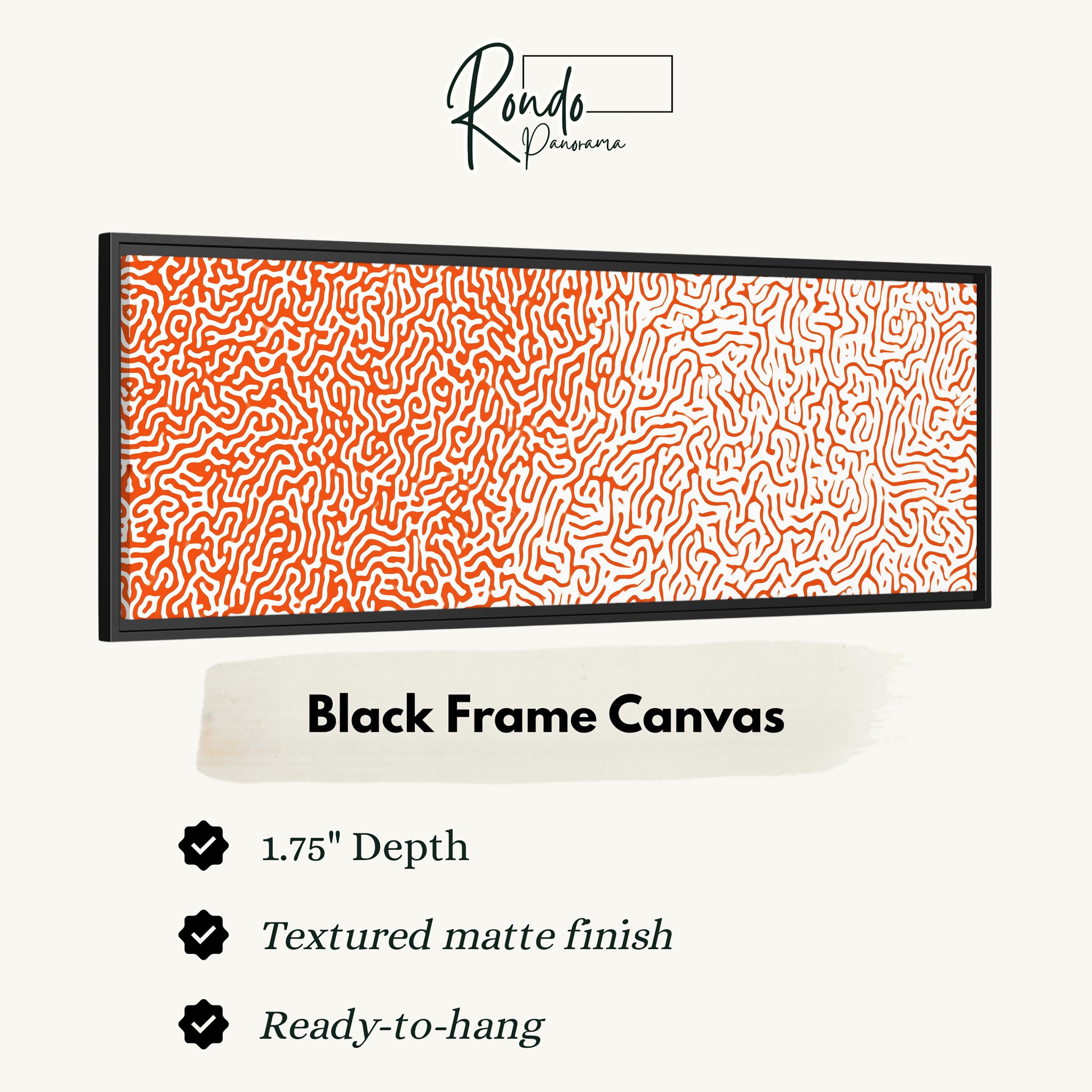 a black frame canvas with an abstract orange and white pattern.
