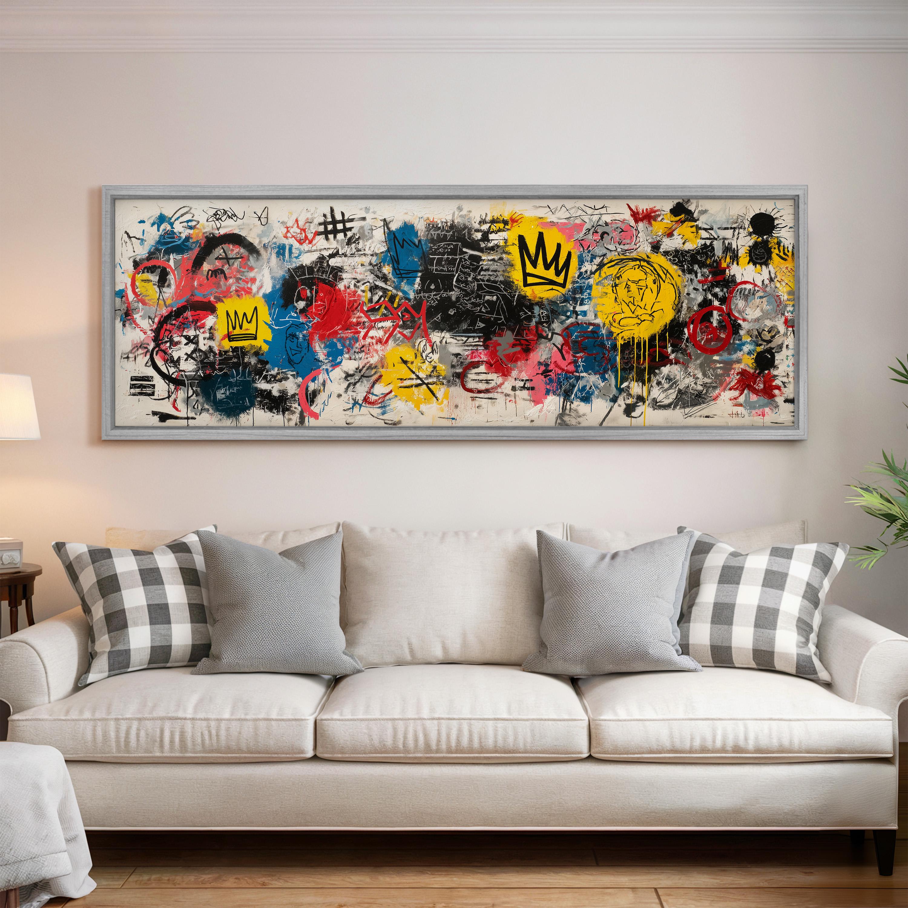 a large, colorful, graffiti-style artwork displayed on a wall above a white couch in a living room setting.