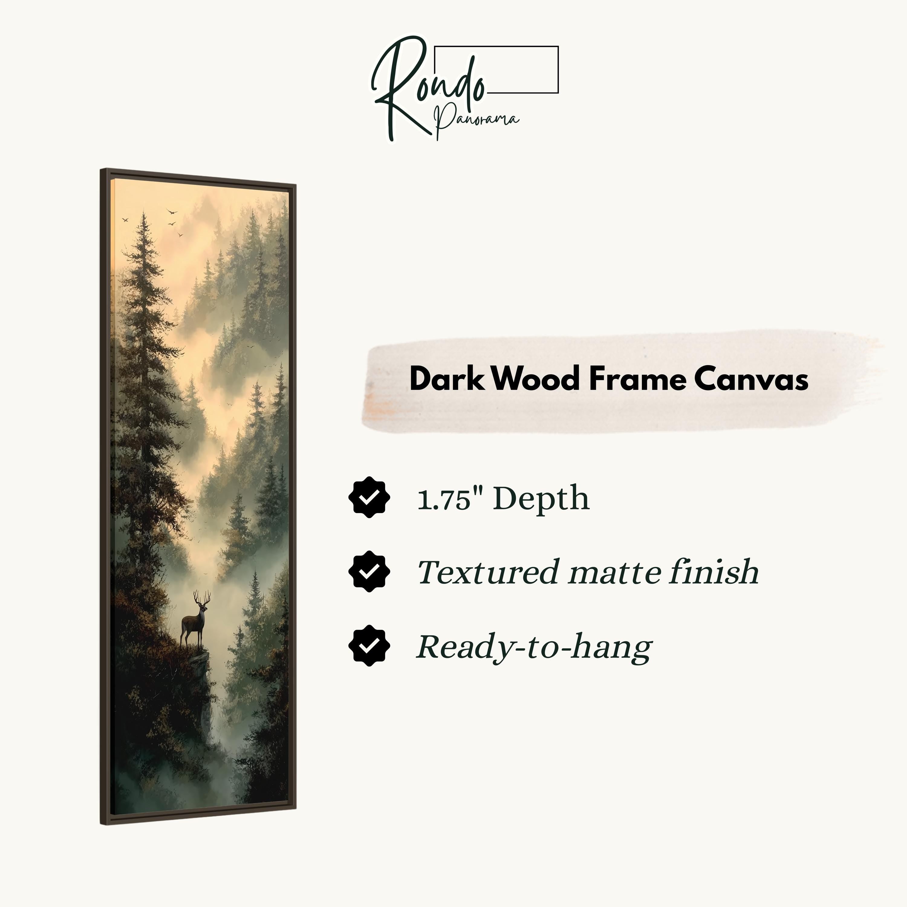 The image is a rectangular dark wood frame canvas depicting a forest scene with a deer standing on a cliff.