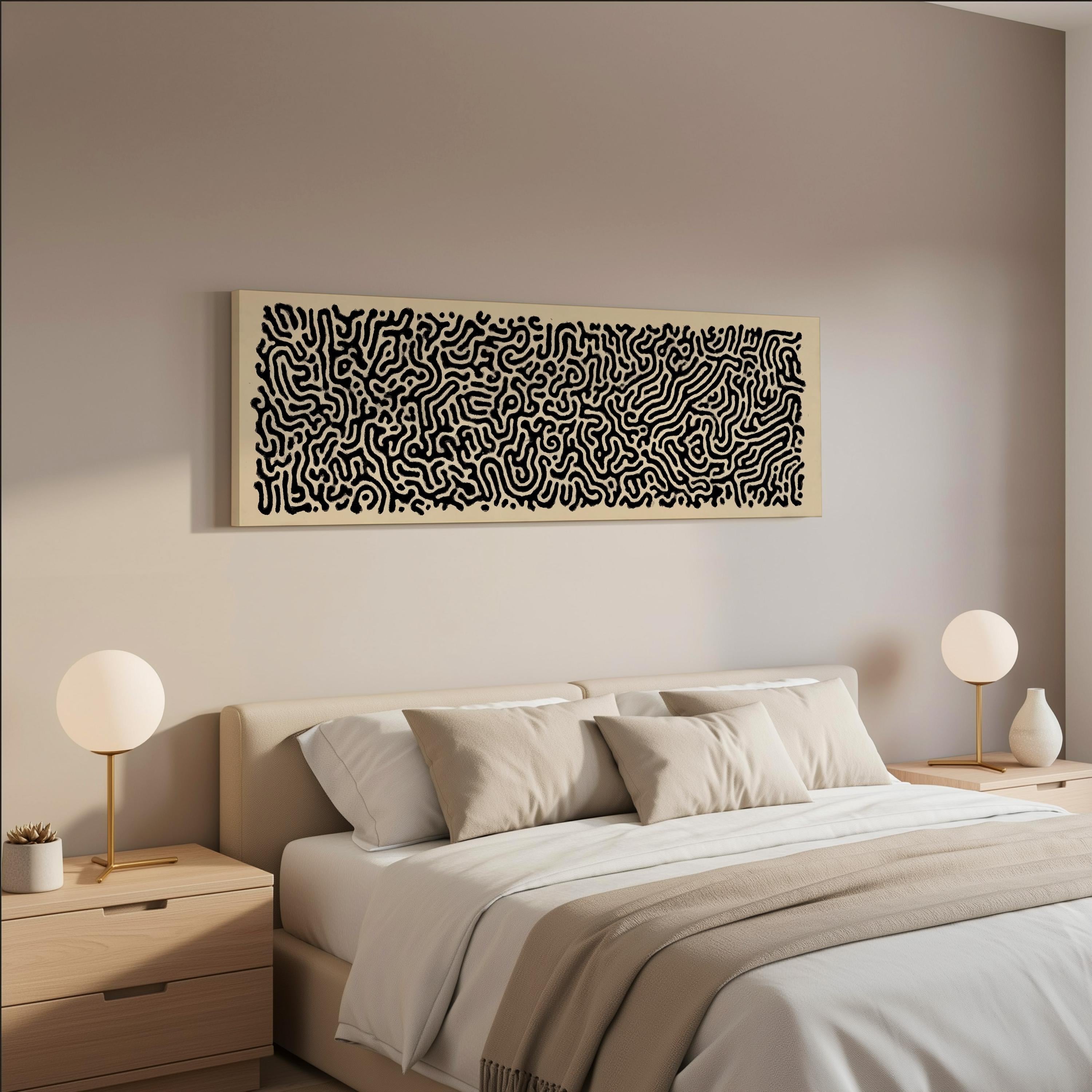 a modern bedroom with a large bed, two nightstands with lamps, and a framed abstract artwork hanging on the wall above the bed.