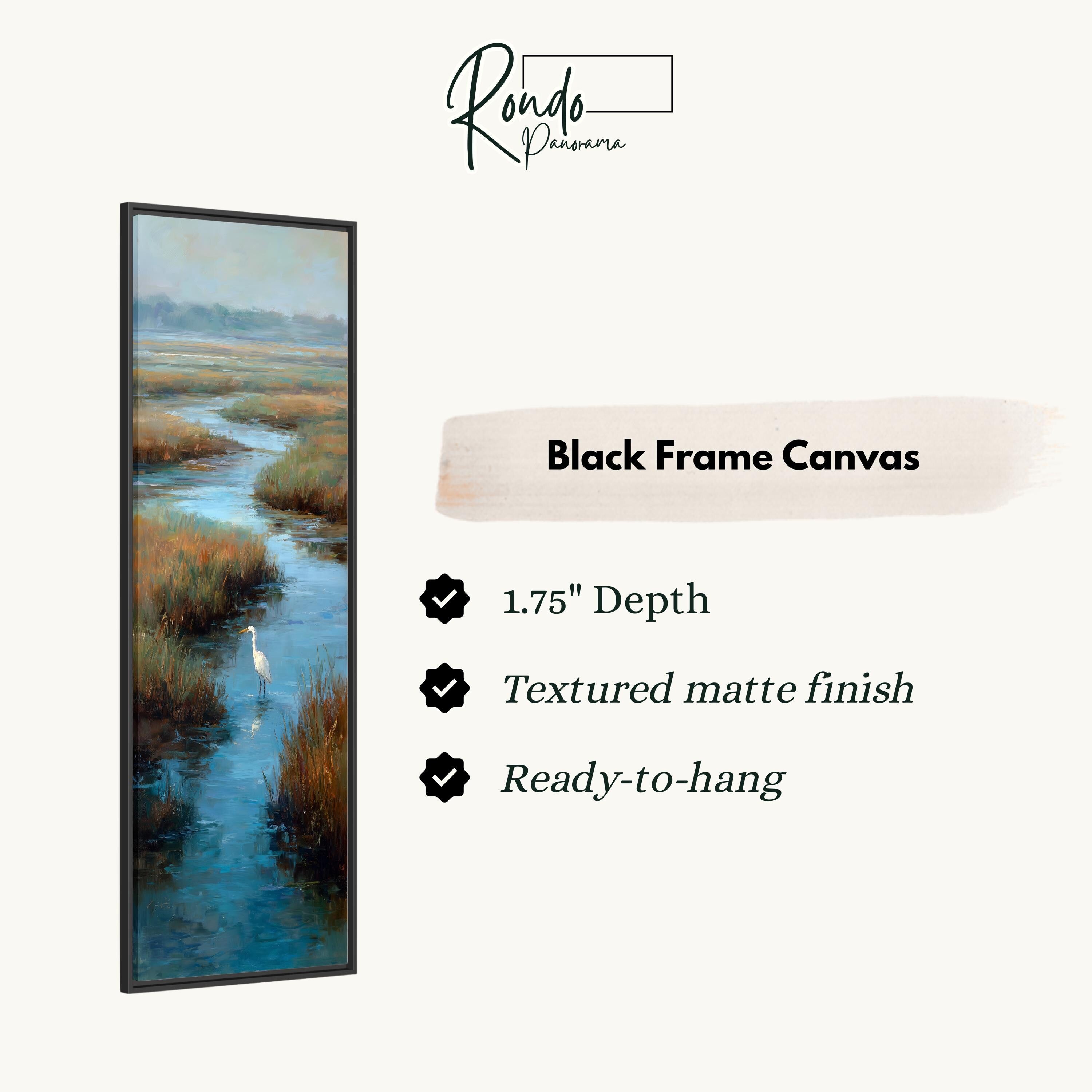The image is a black frame canvas depicting a serene landscape with a bird standing in a body of water.