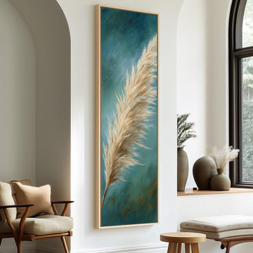 a large painting of a feather hanging on a wall, with a wooden chair and a small table in the foreground.