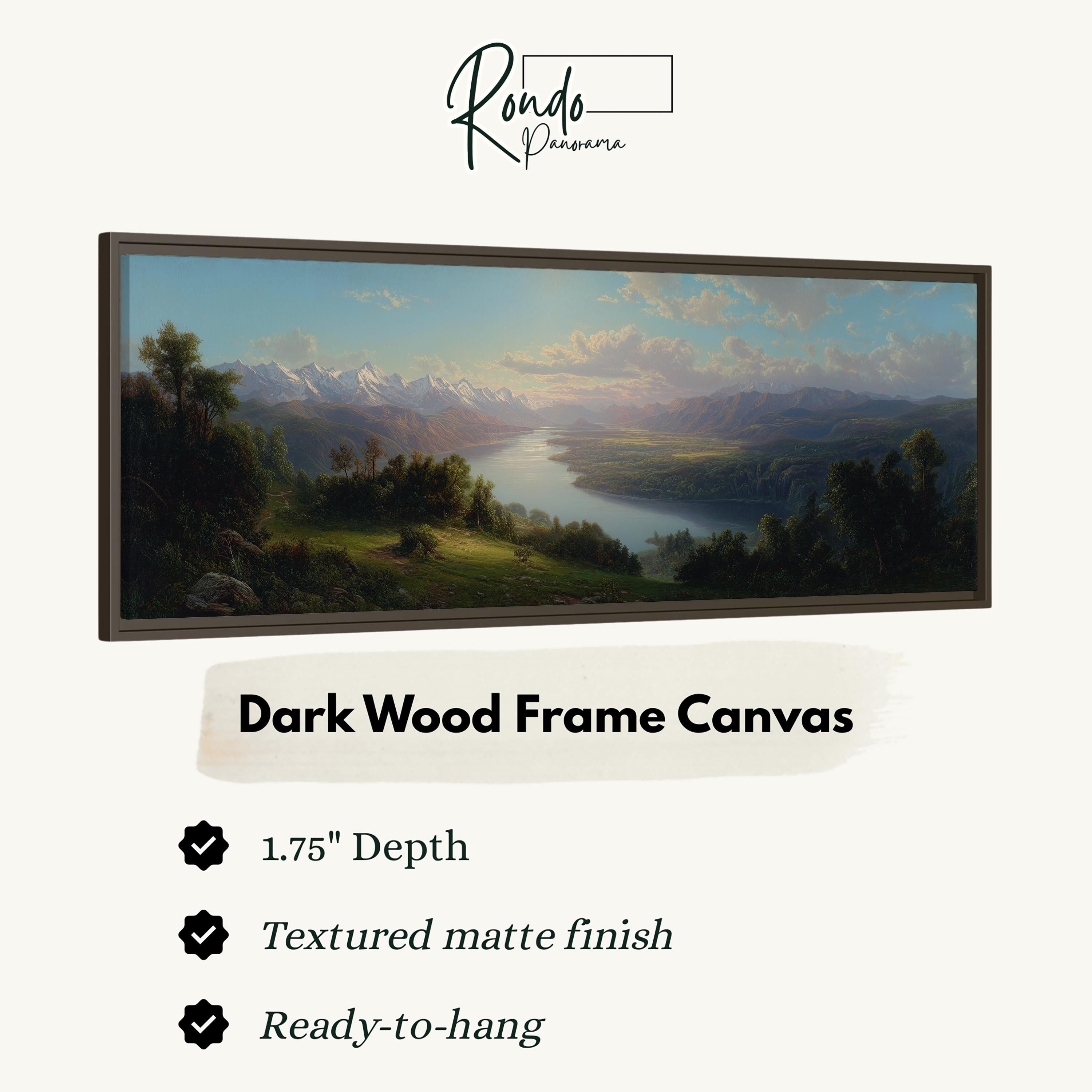 The image is a painting of a landscape with mountains and a river, displayed in a dark wood frame.