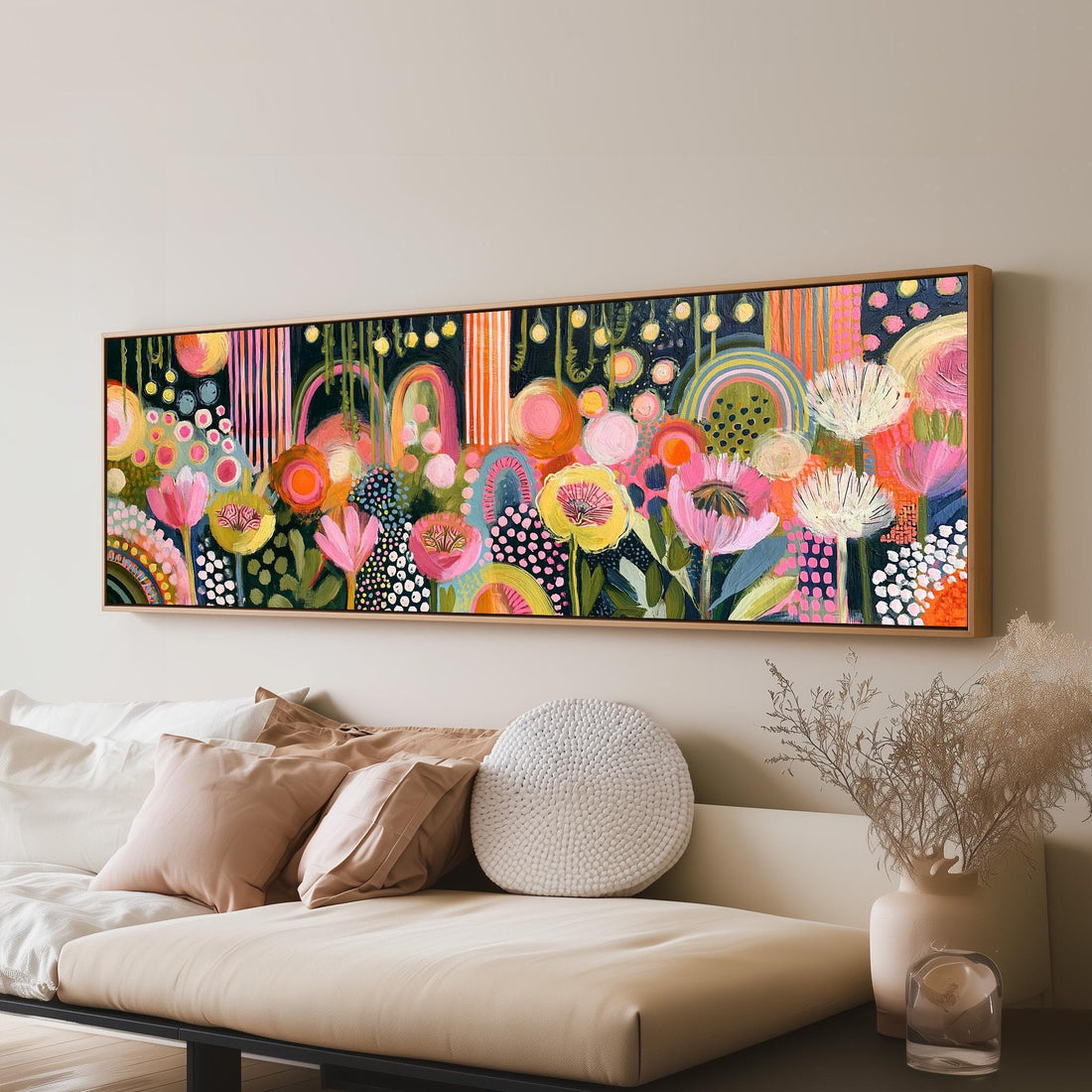 Colorful band of flowers and rainbows long horizontal canvas print above a sofa in a living room