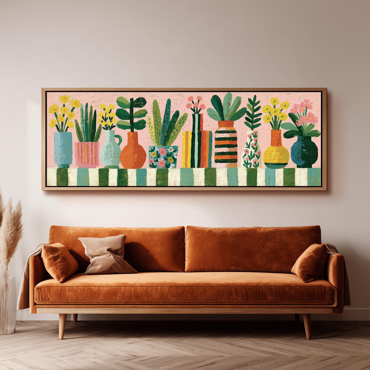 Row of boho potted plants panoramic canvas print above a sofa in a living room