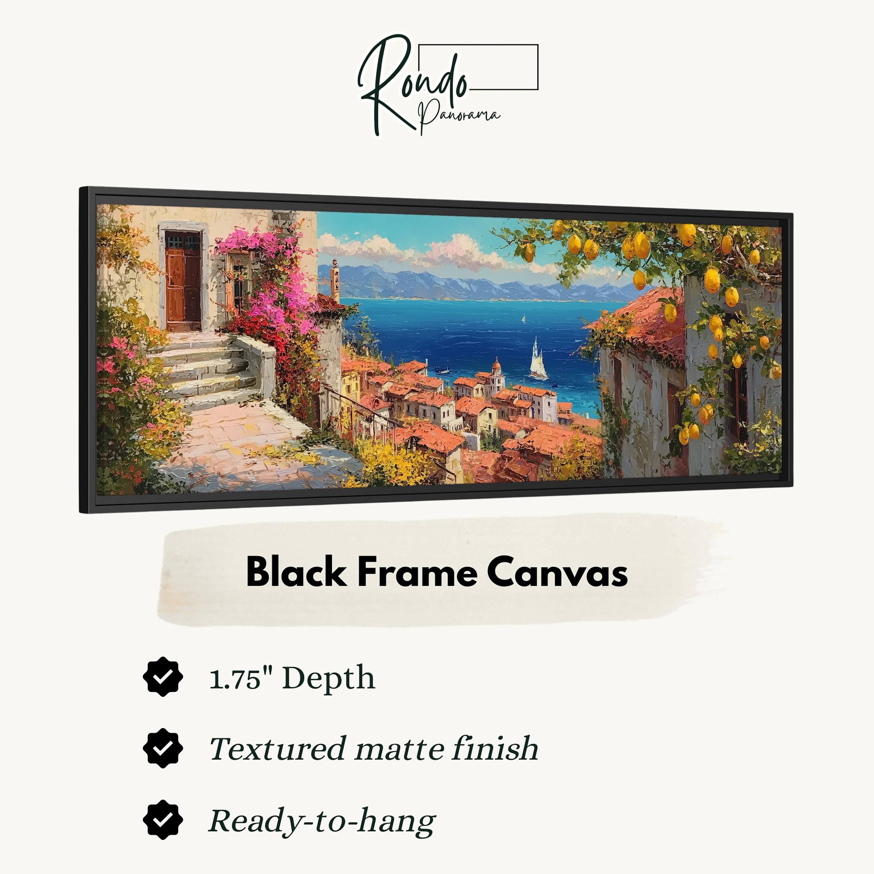 The image is a black frame canvas depicting a picturesque coastal town with a view of the ocean and mountains.