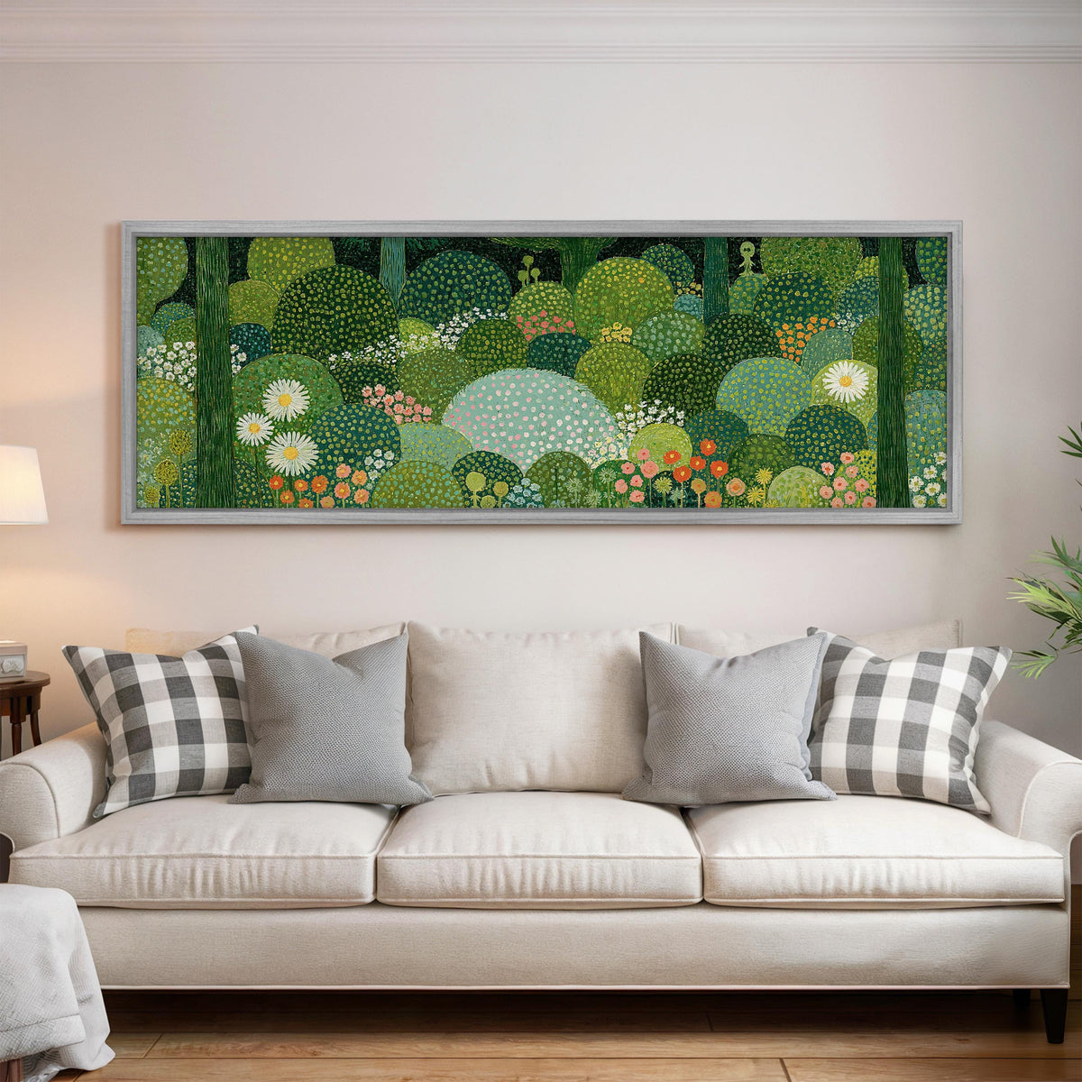 Whimsical dotted topiary garden panoramic canvas print above a white sofa in a bright living room