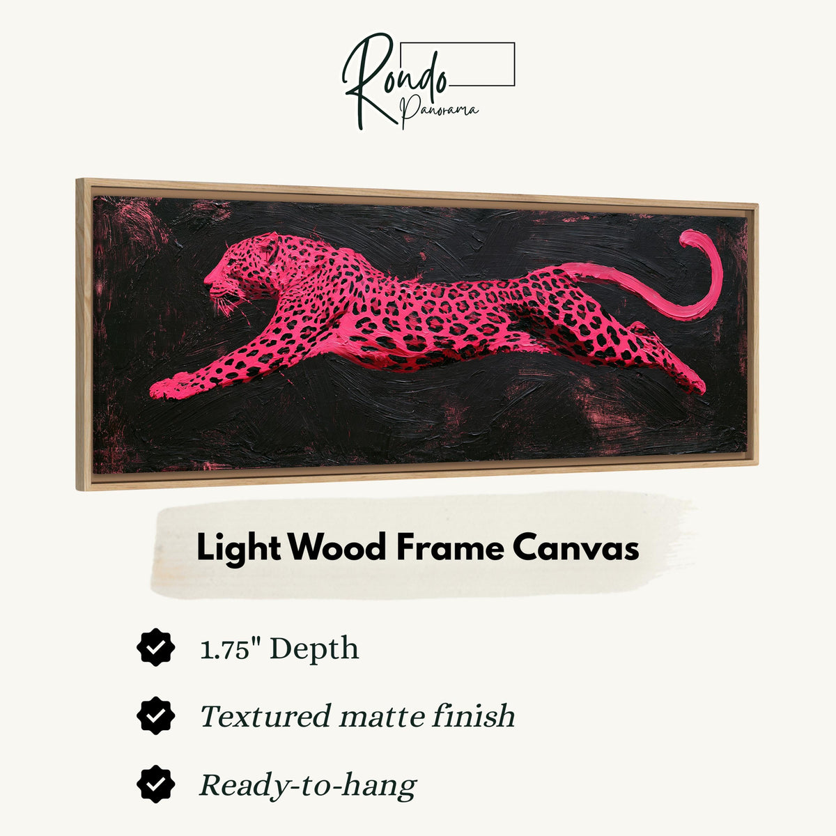 Pink leaping leopard canvas print in a light wood floating frame