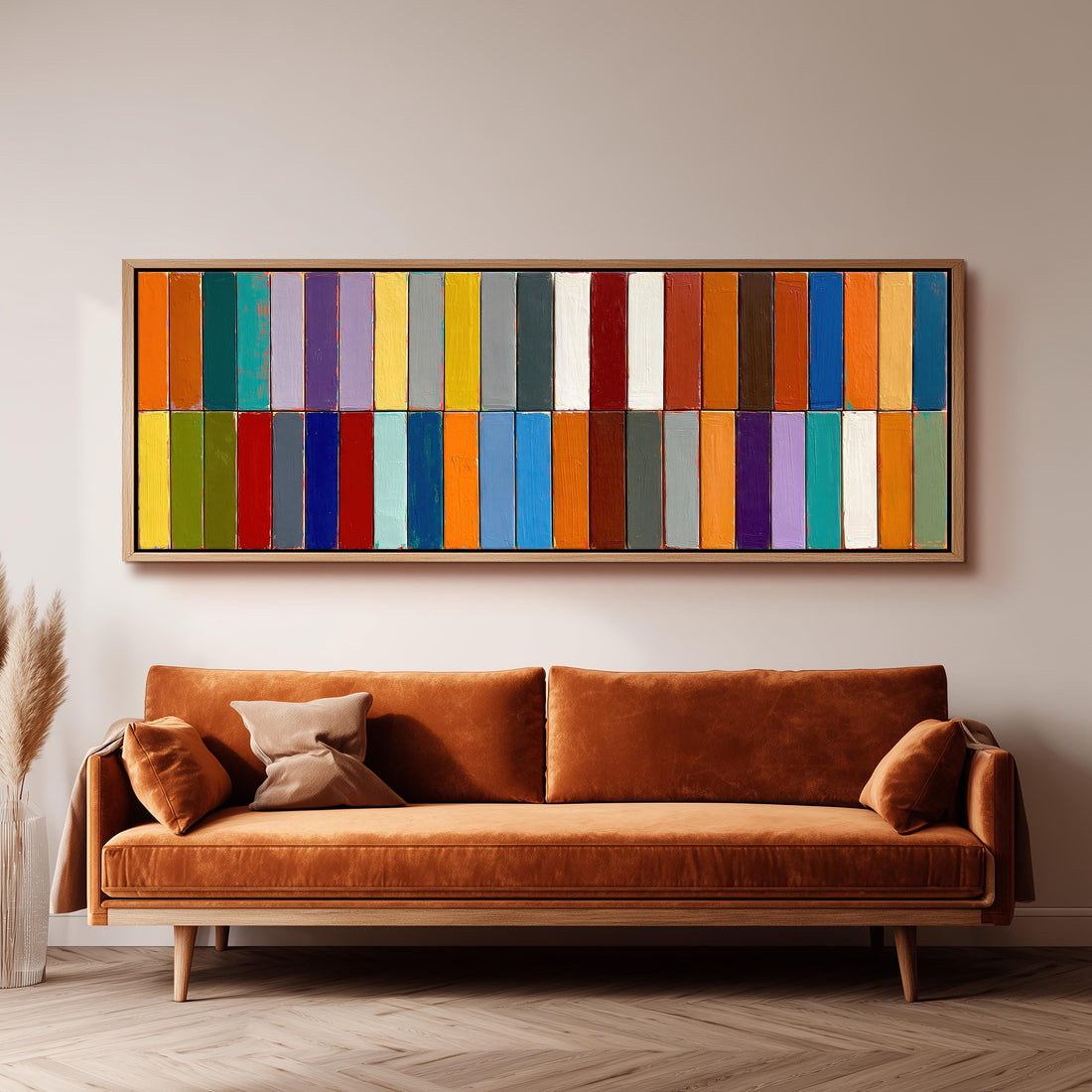 Two rows of colorful stripe blocks long horizontal canvas print above a sofa in a living room