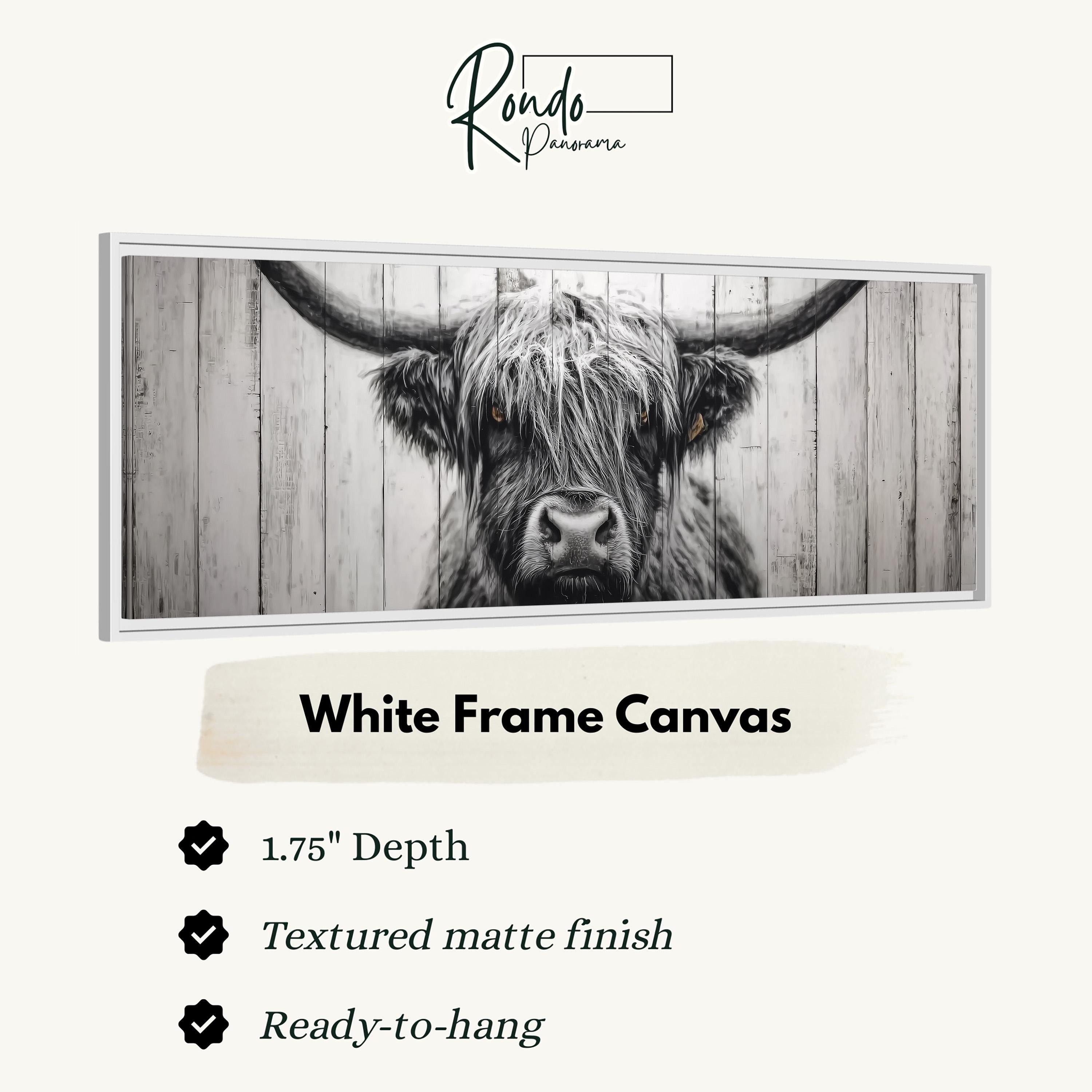 A close-up of a horned animal, likely a yak or a cow, with a textured matte finish. The image is described as a "White Frame Canvas" with a 1.75" depth and a "Textured matte finish". The text indicates that the canvas is ready to hang.