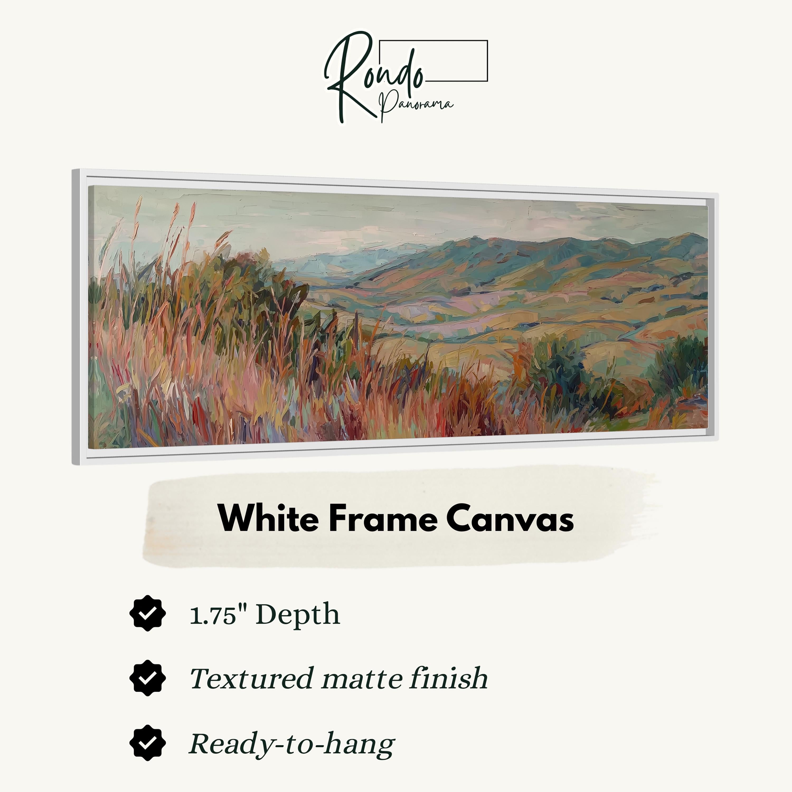 The image is a white frame canvas depicting a landscape with mountains and grassy fields.