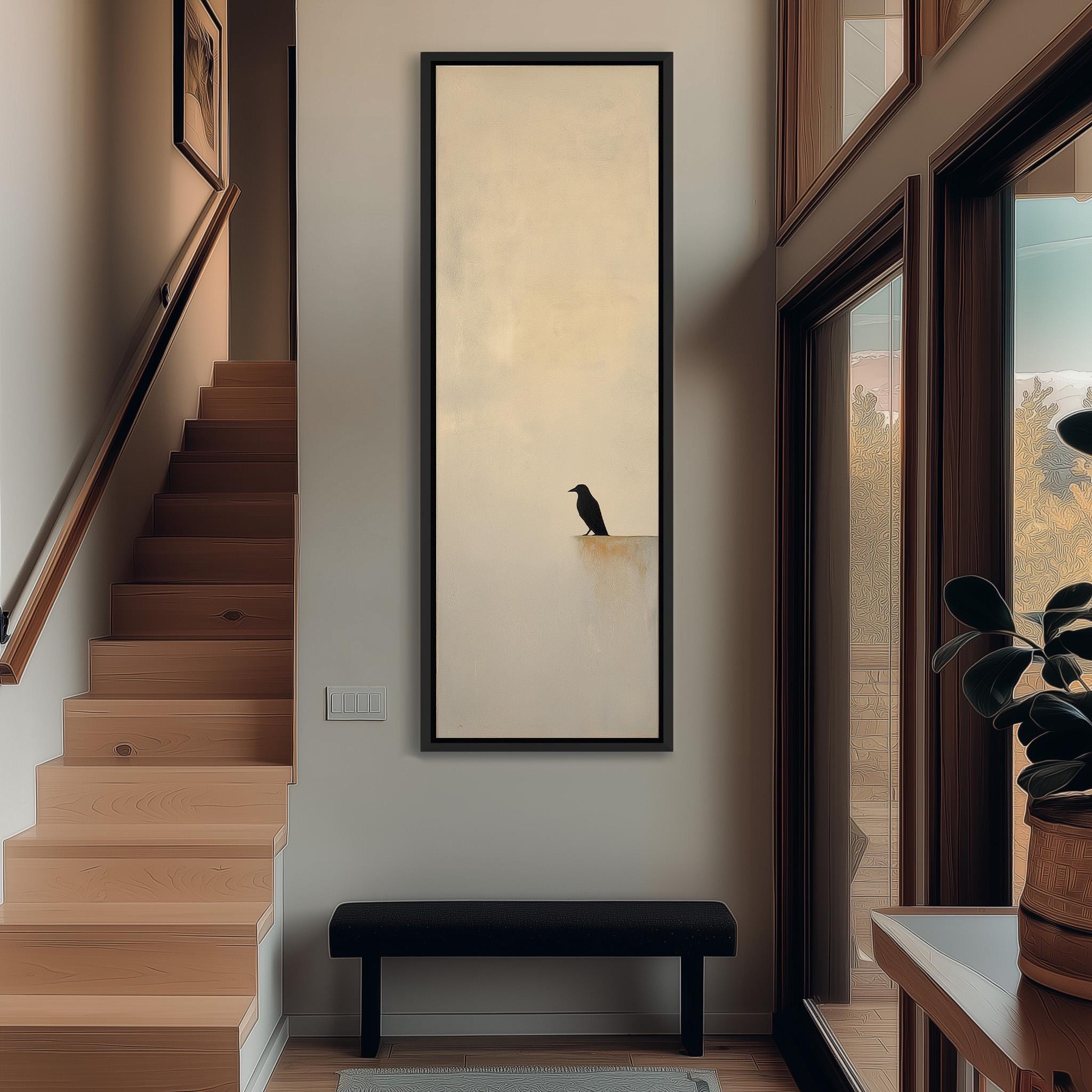 a serene indoor setting with a large painting of a bird perched on a branch hanging on the wall. The painting is framed in black and is the focal point of the room. The room also features a wooden staircase, a bench, and a potted plant, creating a cozy and inviting atmosphere.