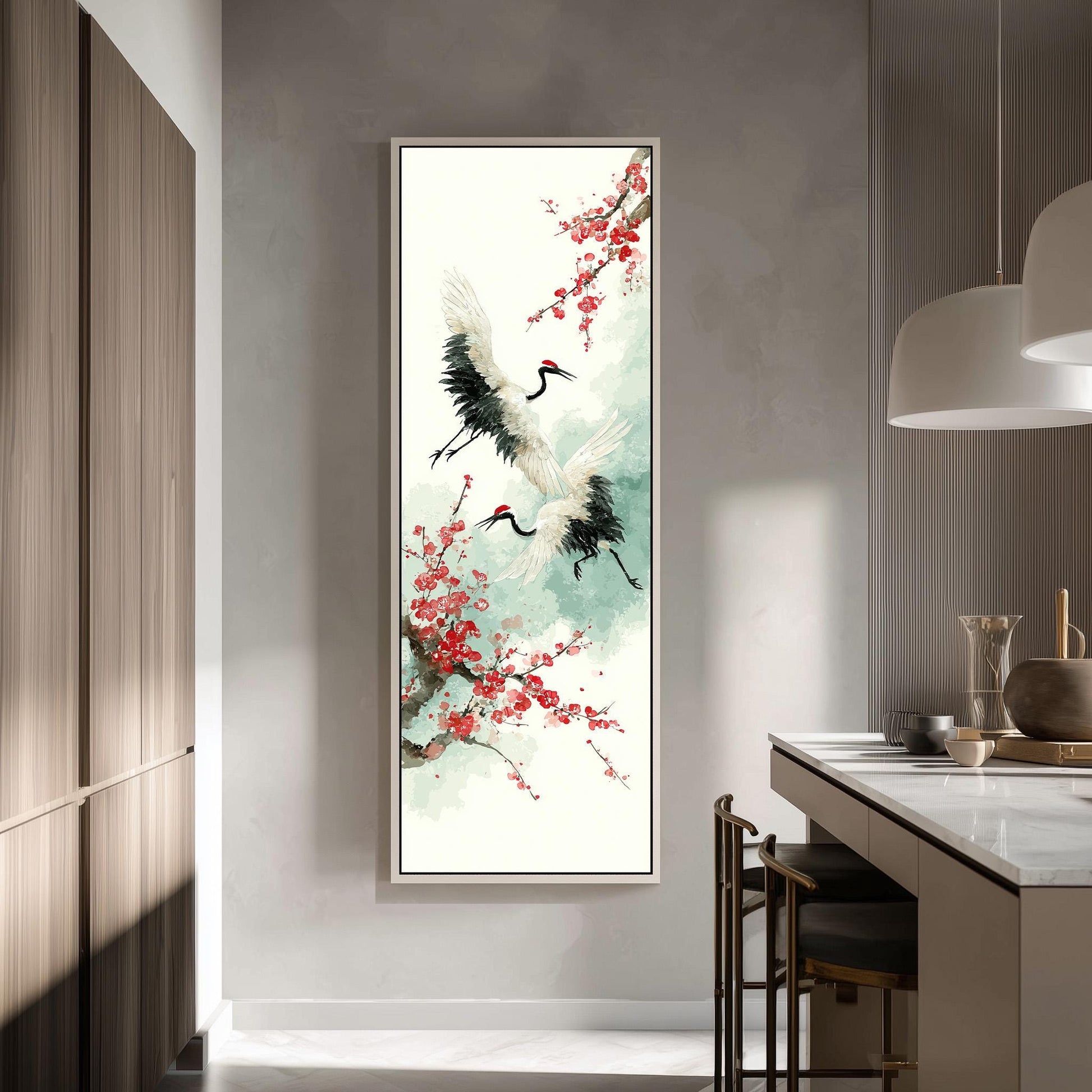 a large framed painting of two white birds with black and red accents, surrounded by red flowers, hanging on a wall in a modern kitchen.
