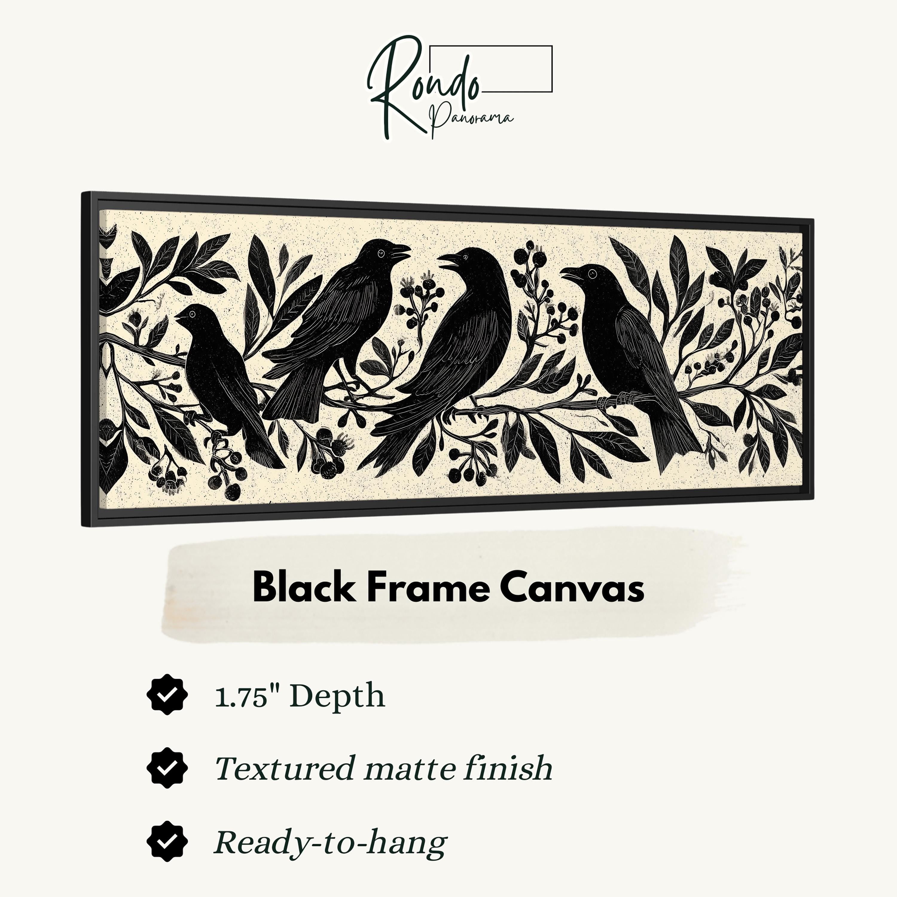 The image is a black and white framed canvas depicting four black birds perched on branches with leaves and berries.