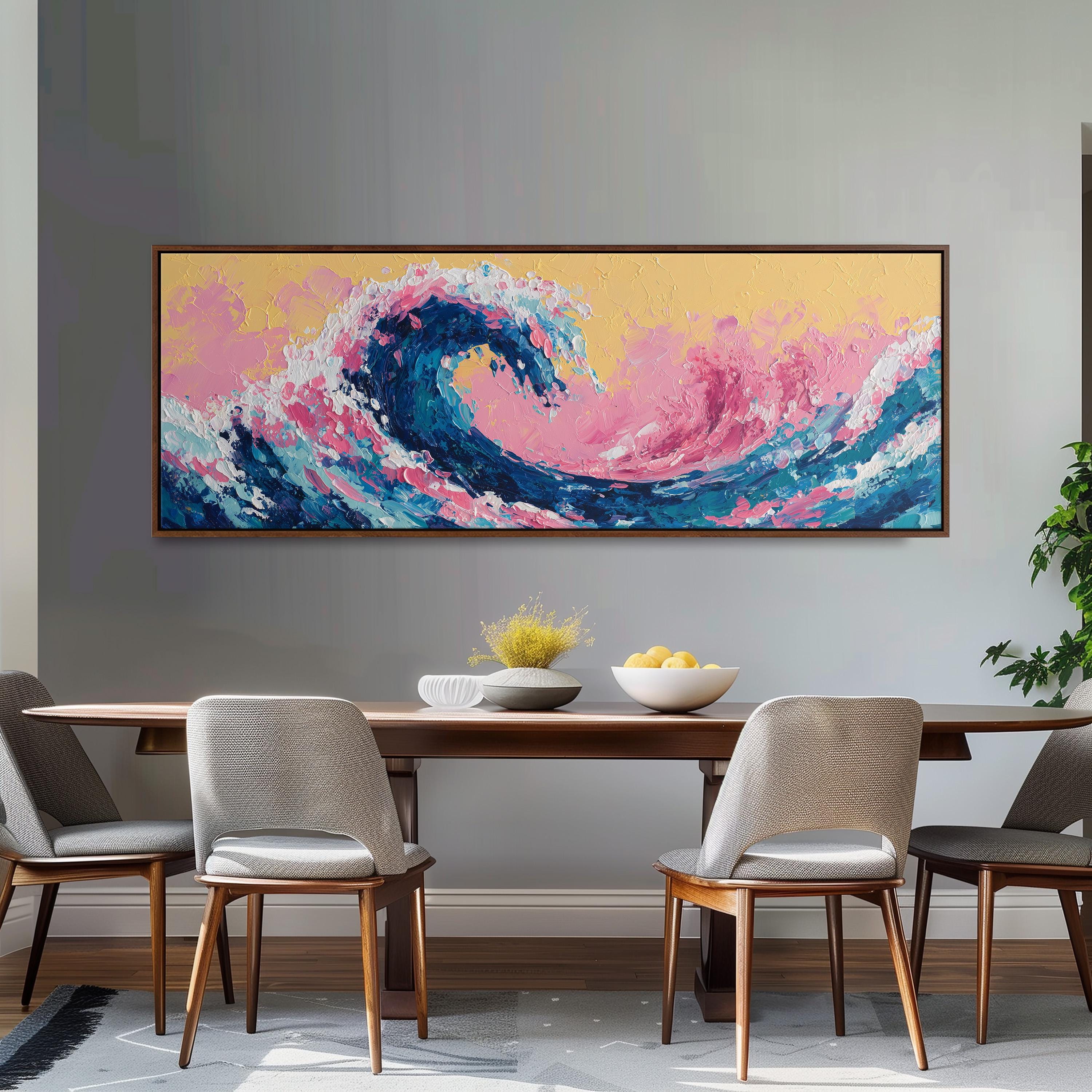 a large, colorful painting of a wave hanging on a wall above a wooden dining table with four chairs.