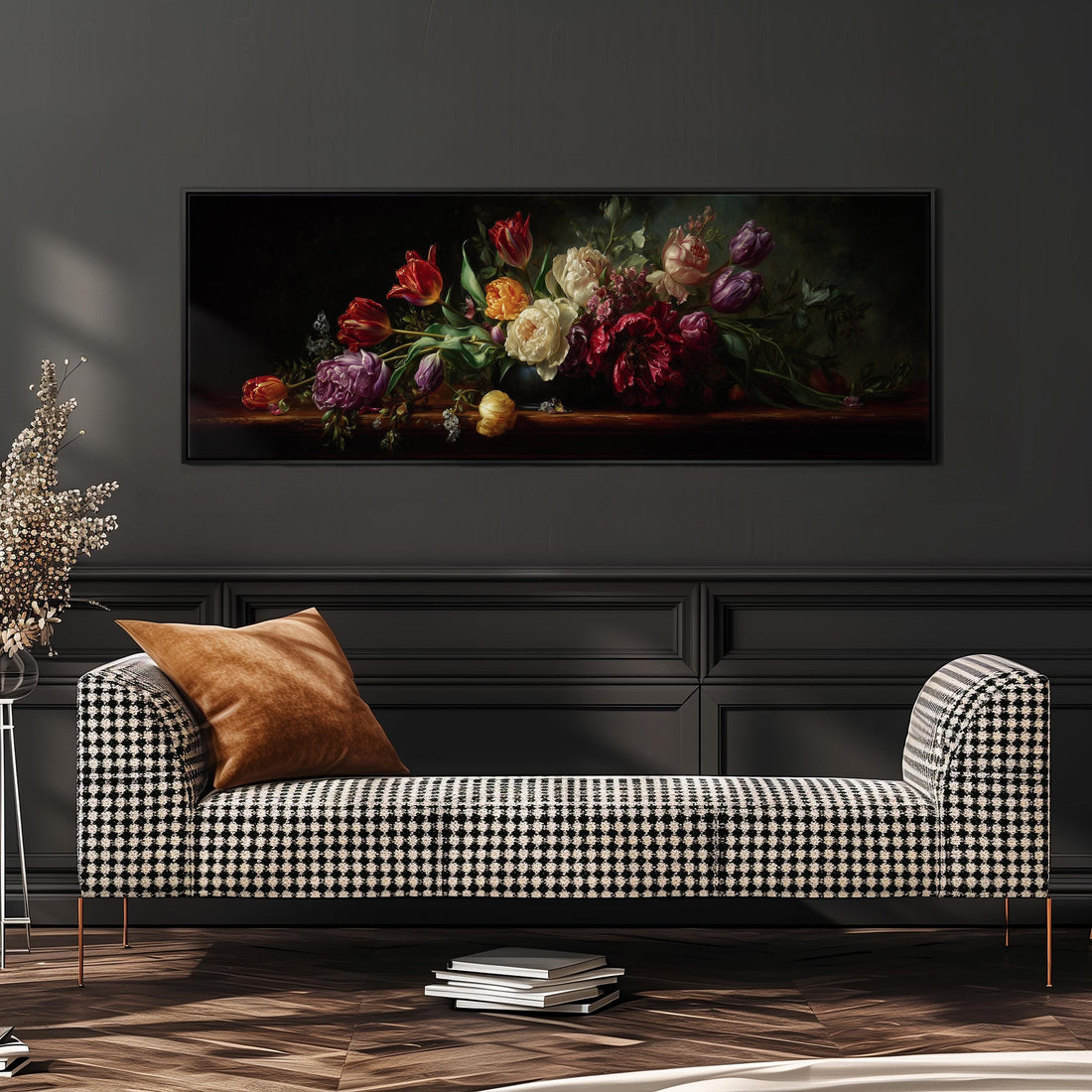 a large painting of a bouquet of flowers hanging on a wall above a black and white checkered sofa.