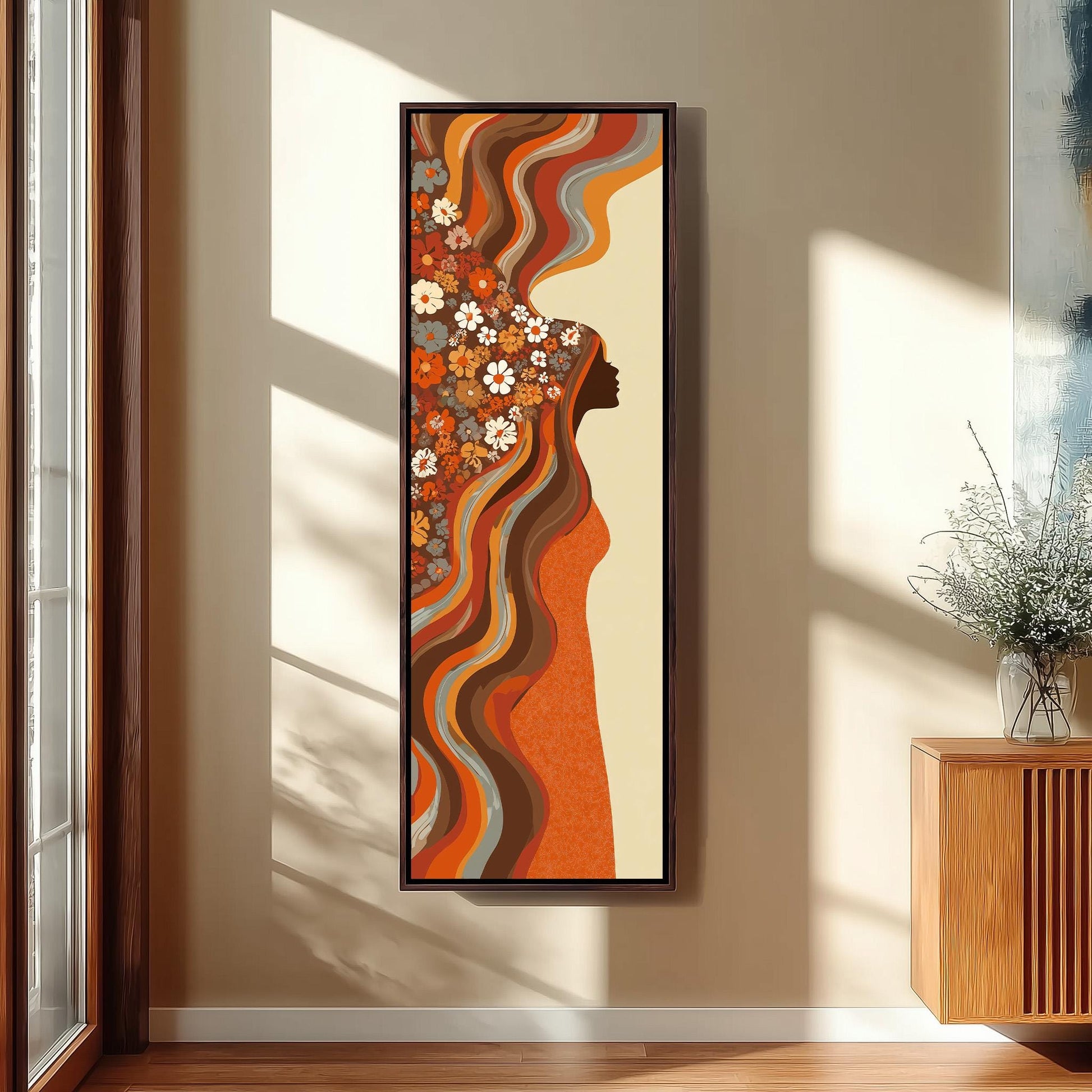 a large abstract painting hanging on a wall, depicting a stylized female figure with a floral design.