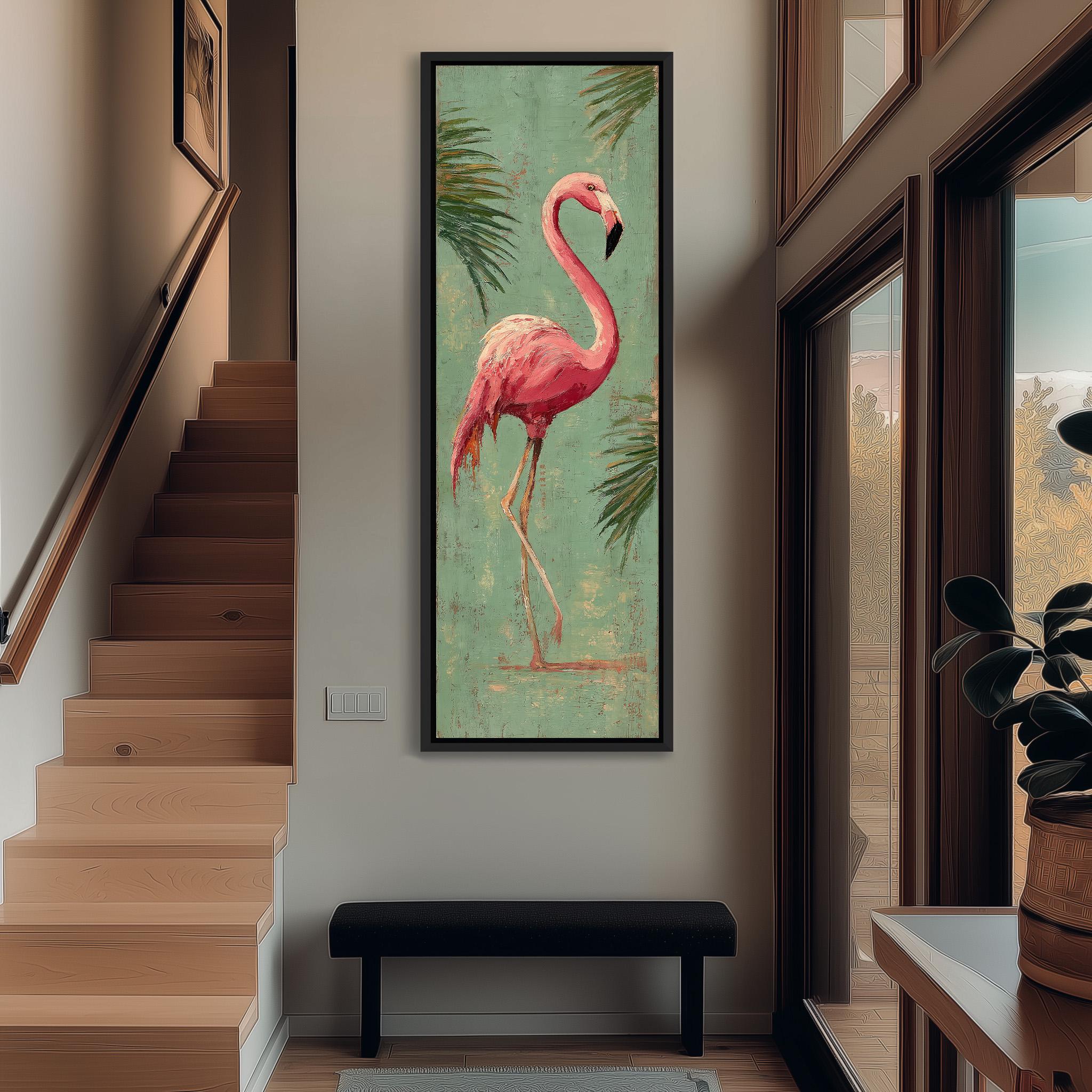 a large framed painting of a pink flamingo standing on one leg, hanging on a wall in a hallway.