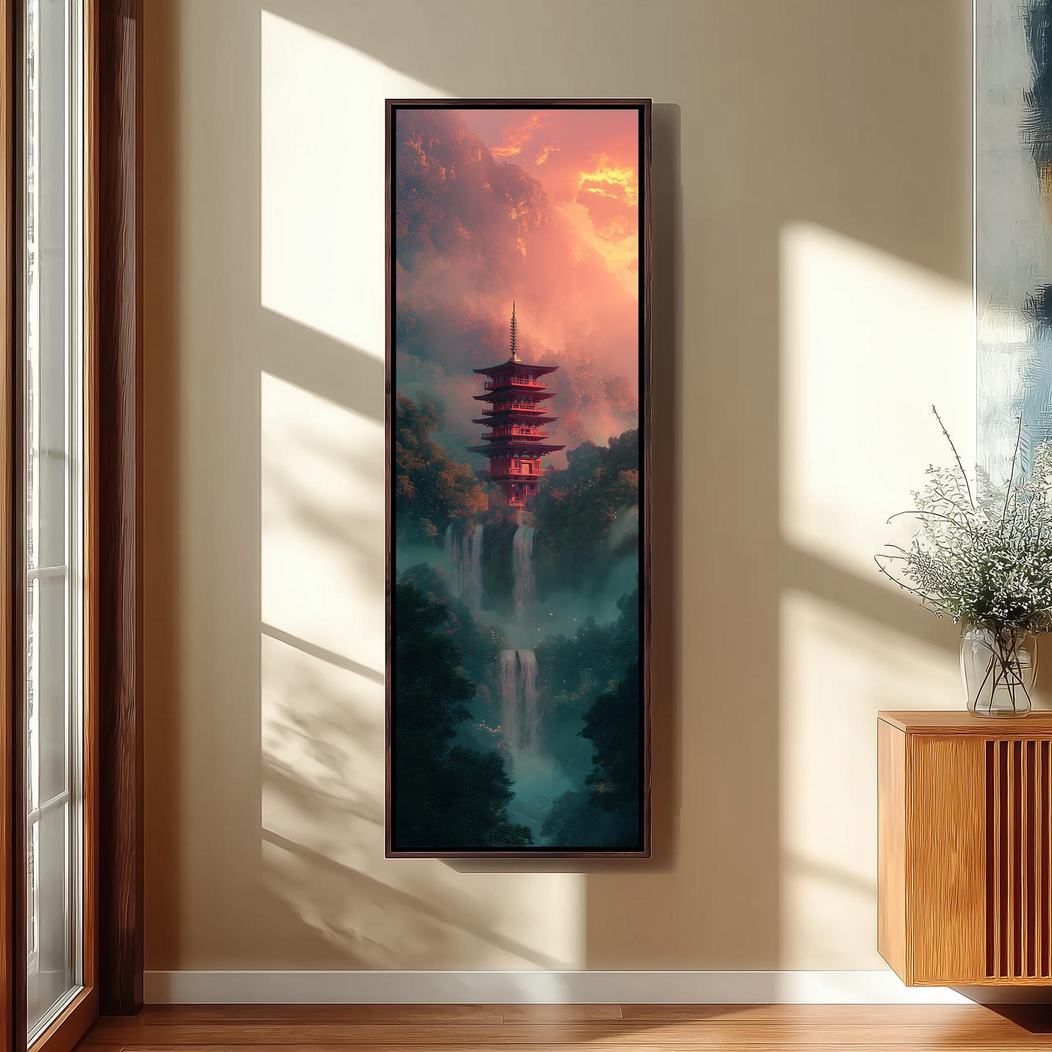 a large, colorful painting of a pagoda-style building with a waterfall in the background, hanging on a wall in a room with a wooden floor and a window.