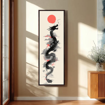 a large, framed artwork of a dragon with a red sun in the background, hanging on a wall in a room.