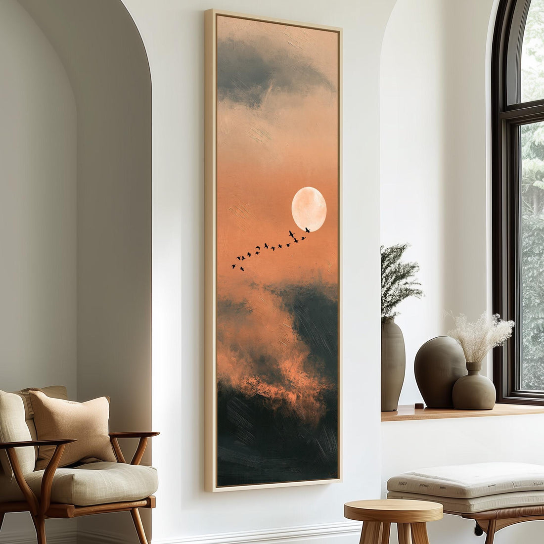 Birds flying past a rising moon in an orange sky long vertical canvas print in a sunlit living space