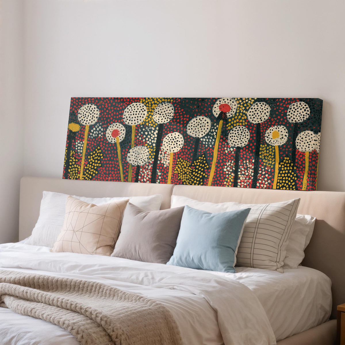 Dotted dandelion meadow wide panoramic canvas print above a bed in a bedroom