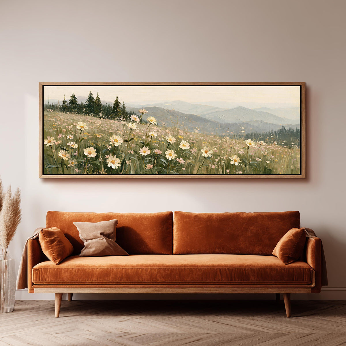Daisy hillside below blue mountains panoramic canvas print above a sofa in a living room