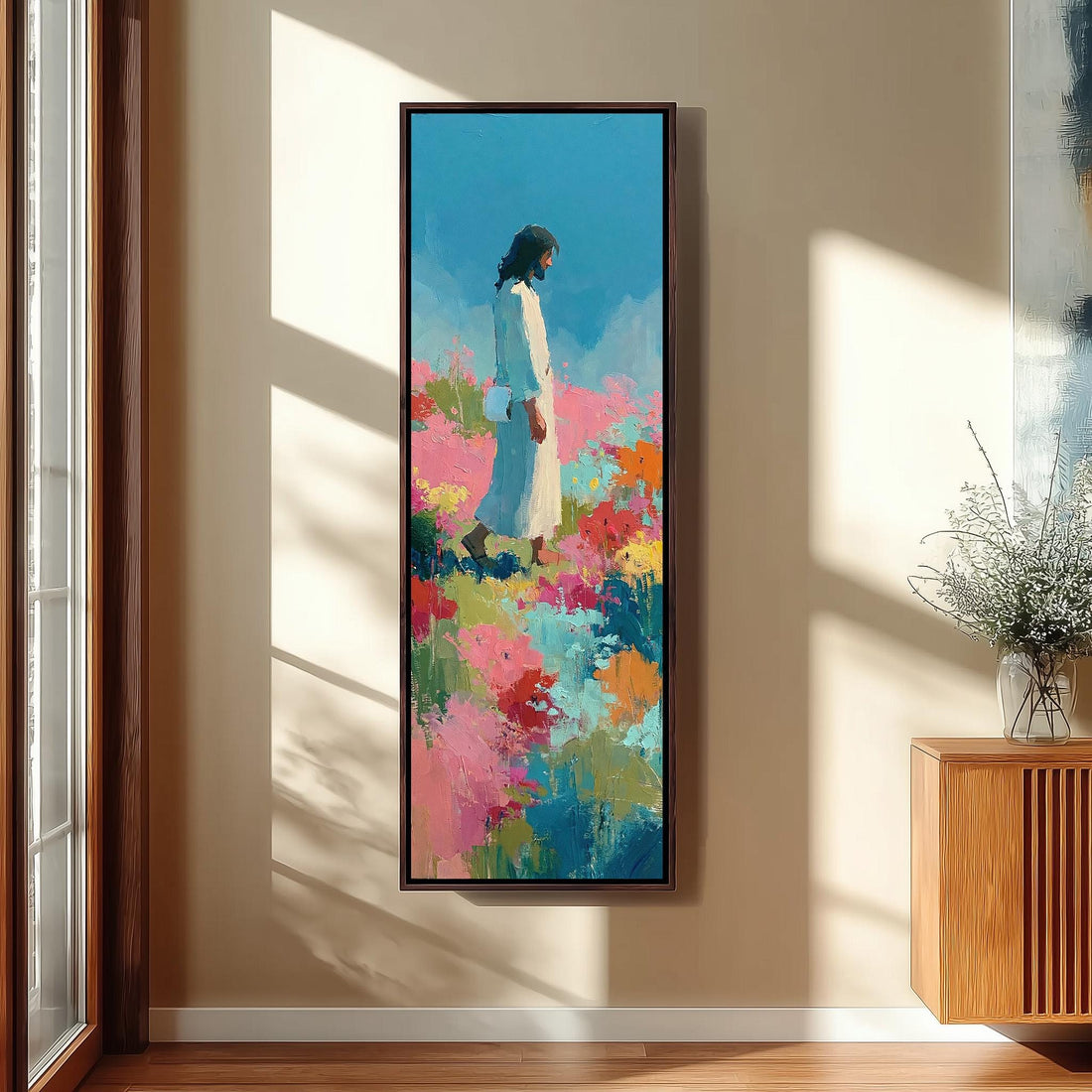Jesus standing in a colorful flower meadow long vertical canvas print in a sunlit living space