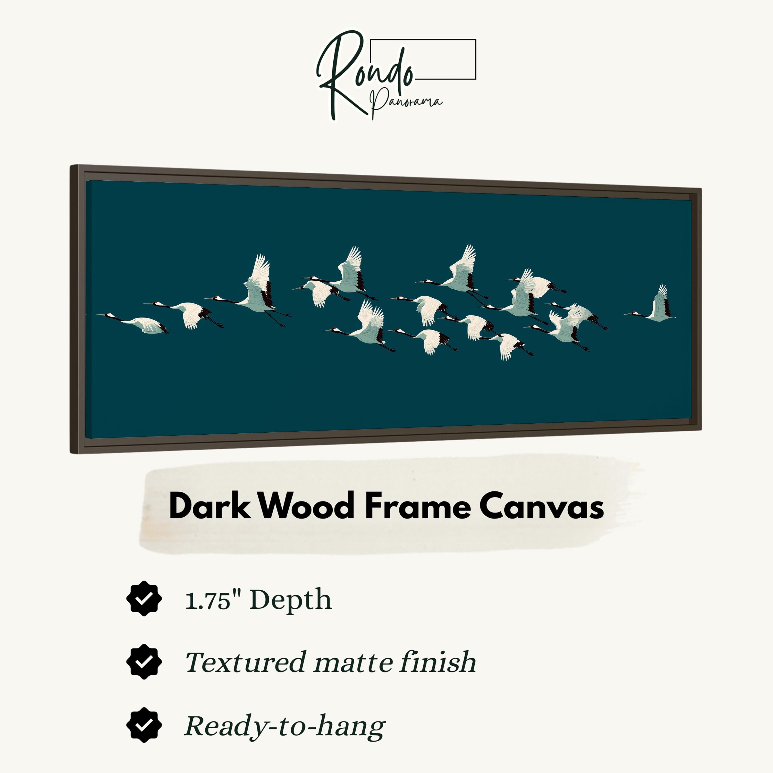 a dark wood frame canvas with a flock of white birds flying across a dark blue background.