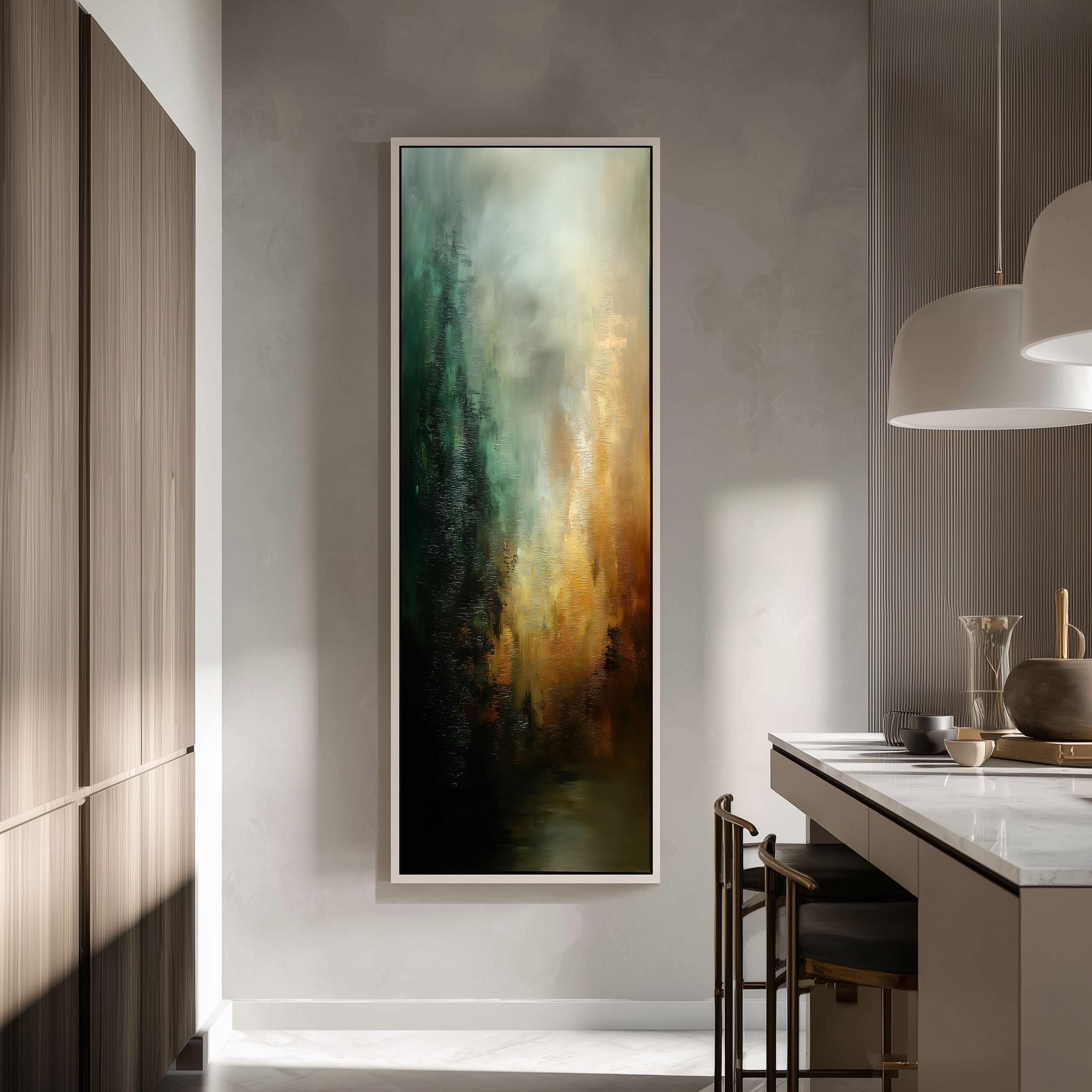 a modern kitchen with a large abstract painting hanging on the wall above a counter. The painting has a mix of green, orange, and black colors, creating a vibrant and dynamic visual effect. The kitchen is well-lit, with natural light streaming in from the windows, and the overall design has a clean and minimalist aesthetic.