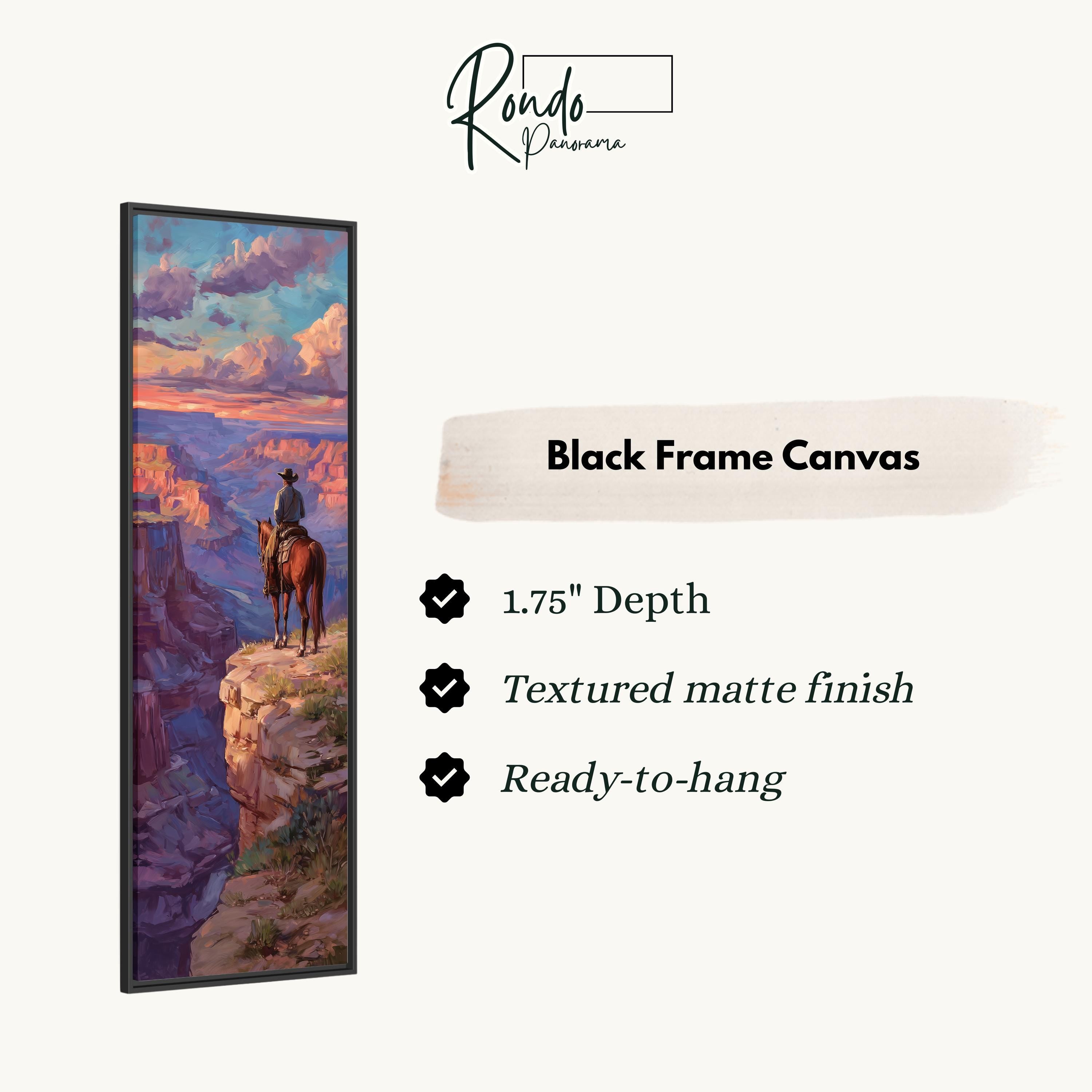 The image is a black frame canvas depicting a cowboy riding a horse on a cliff overlooking a valley.