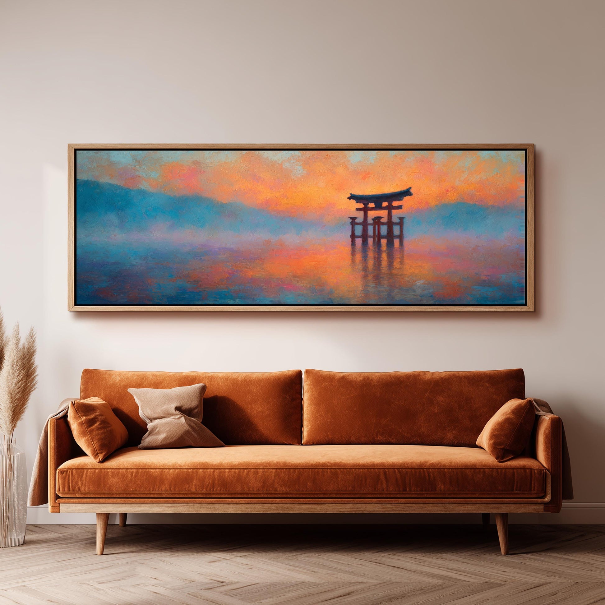 a large, rectangular painting hanging on a wall above a brown sofa.