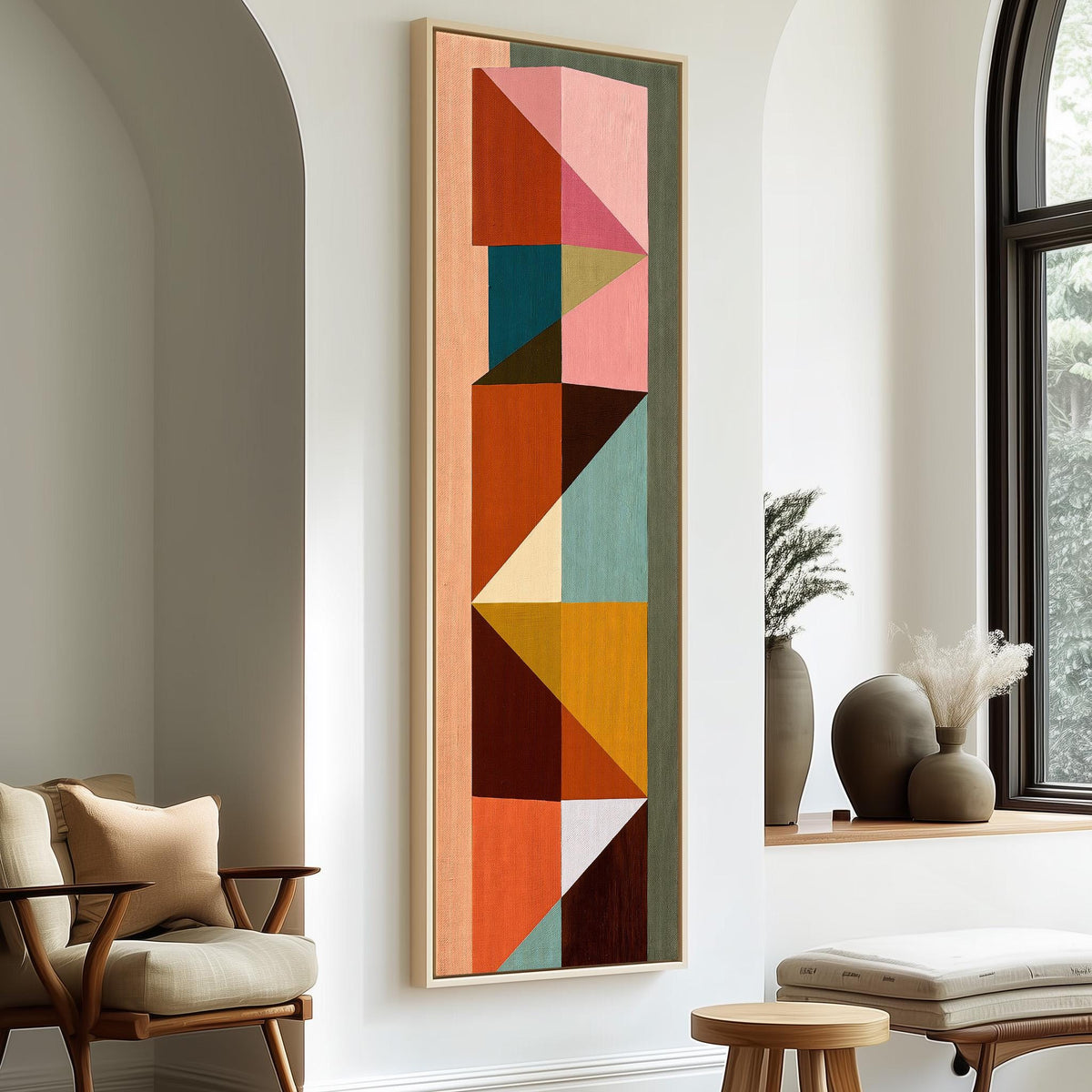 Stacked colorful triangle mosaic tall skinny canvas print in a sunlit living space