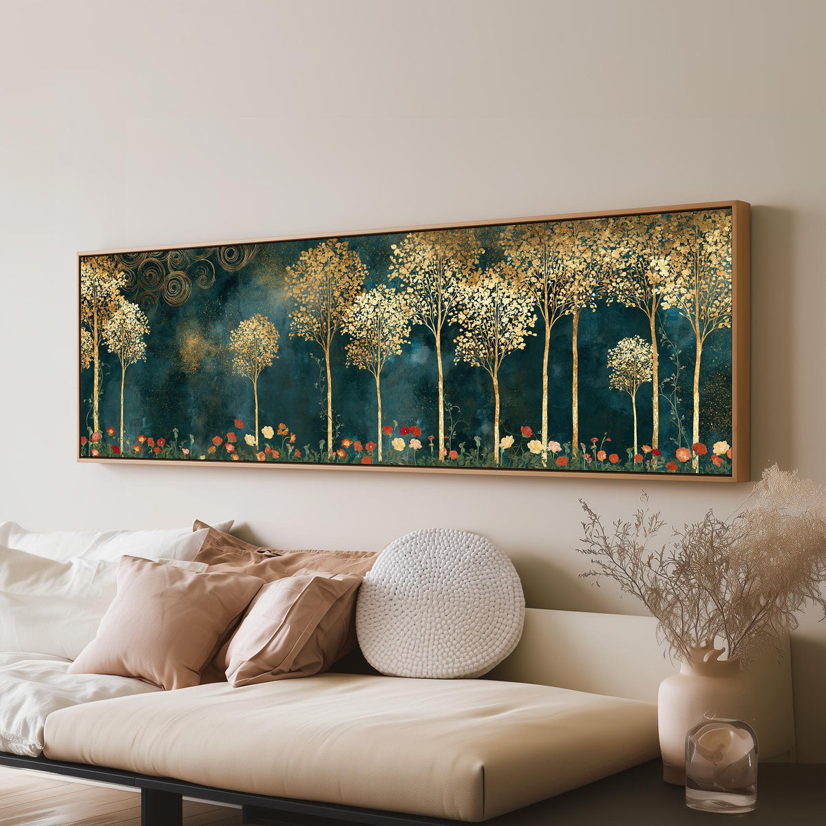 Gold leaf trees above red poppies on teal long horizontal canvas print above a sofa in a living room