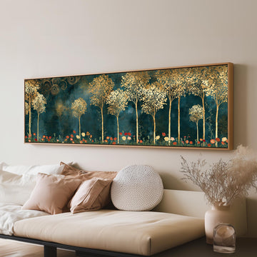 Gold leaf trees above red poppies on teal long horizontal canvas print above a sofa in a living room