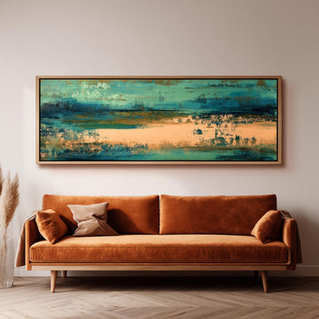 a large, rectangular painting hanging on a white wall above a brown sofa with orange cushions.