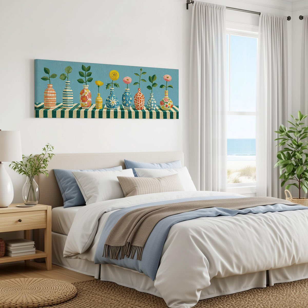 Row of striped vases with flowers panoramic canvas print above a bed in a coastal bedroom