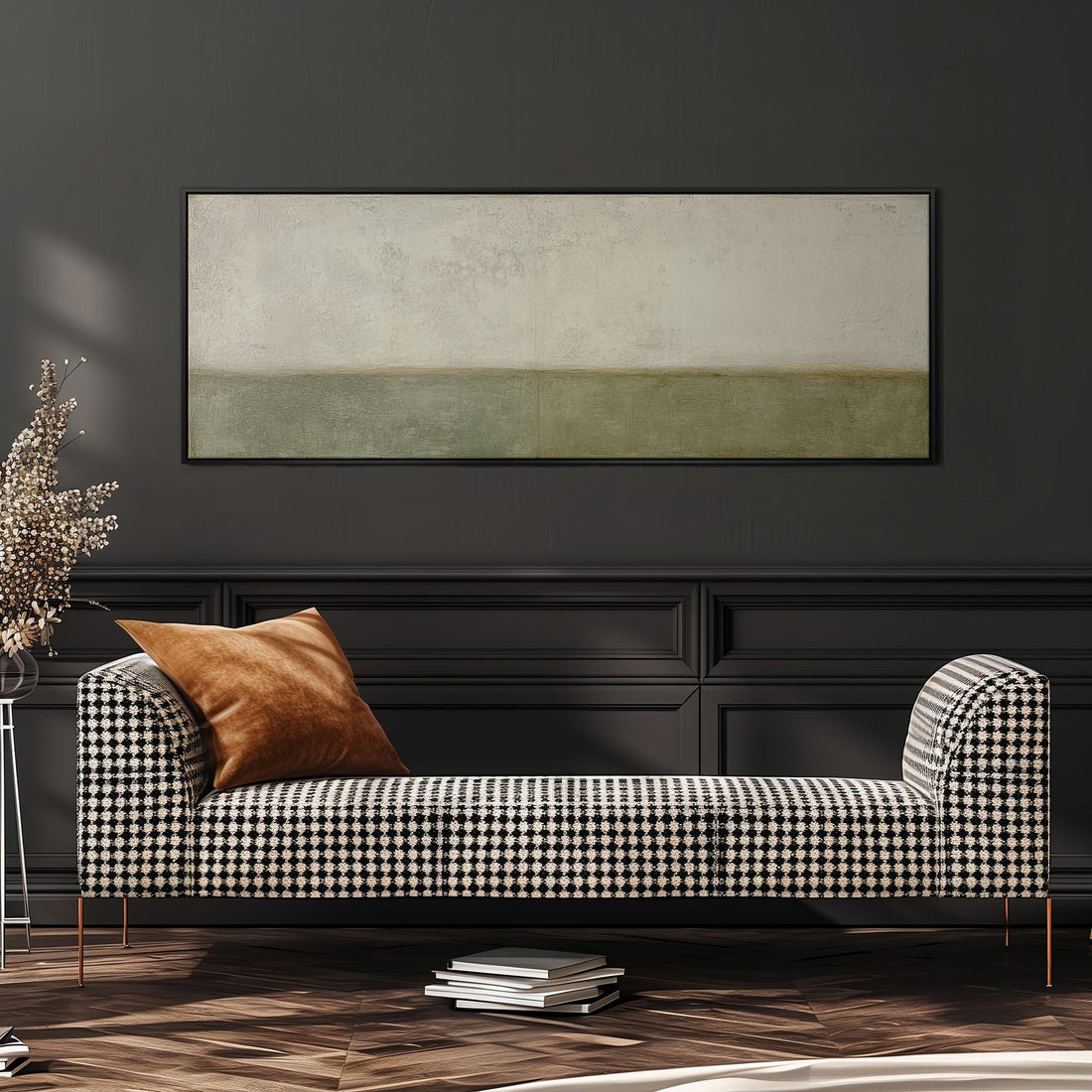 a large, rectangular painting hanging on a wall above a brown sofa with orange cushions.