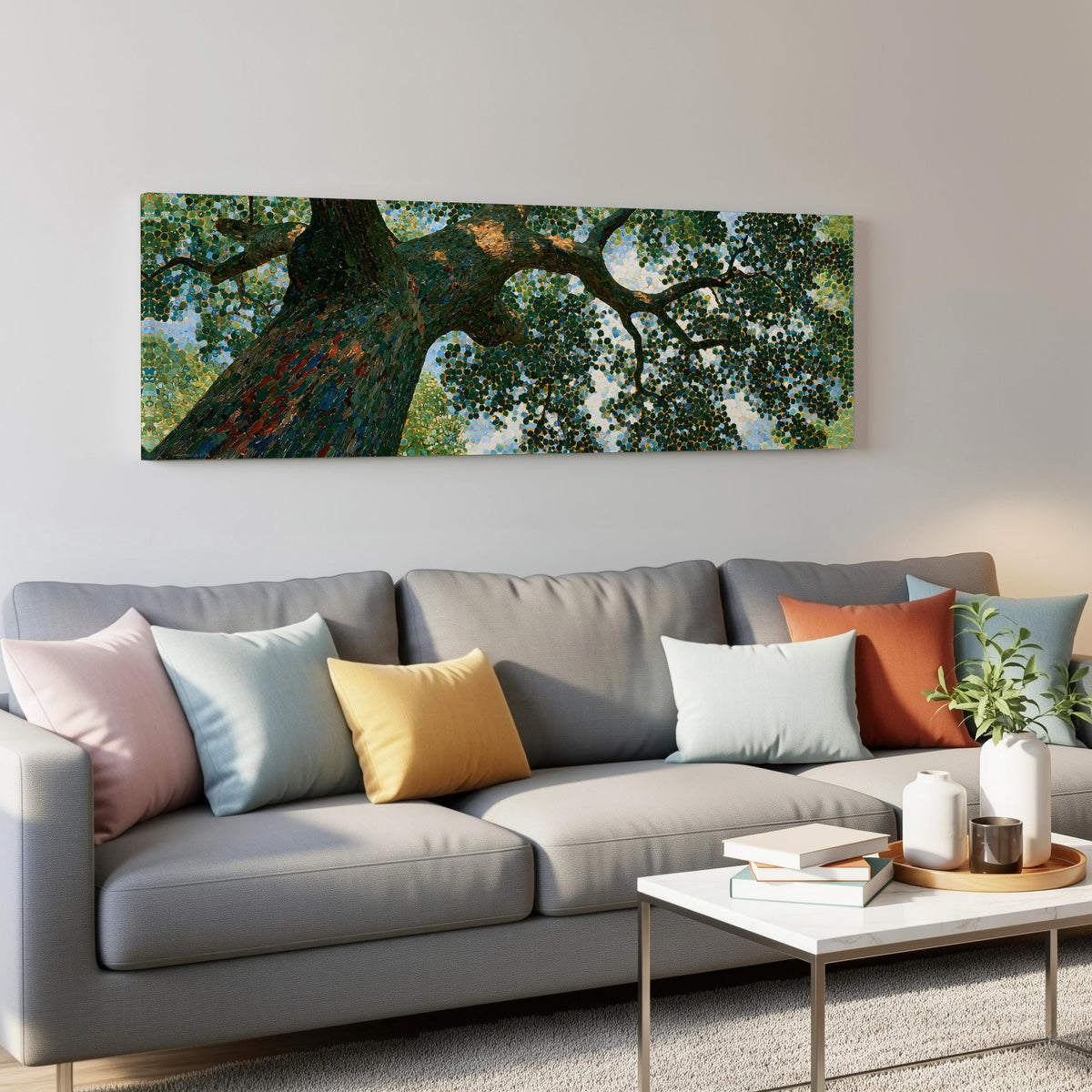 Looking up into an oak canopy panoramic canvas print above a grey sofa in a living room