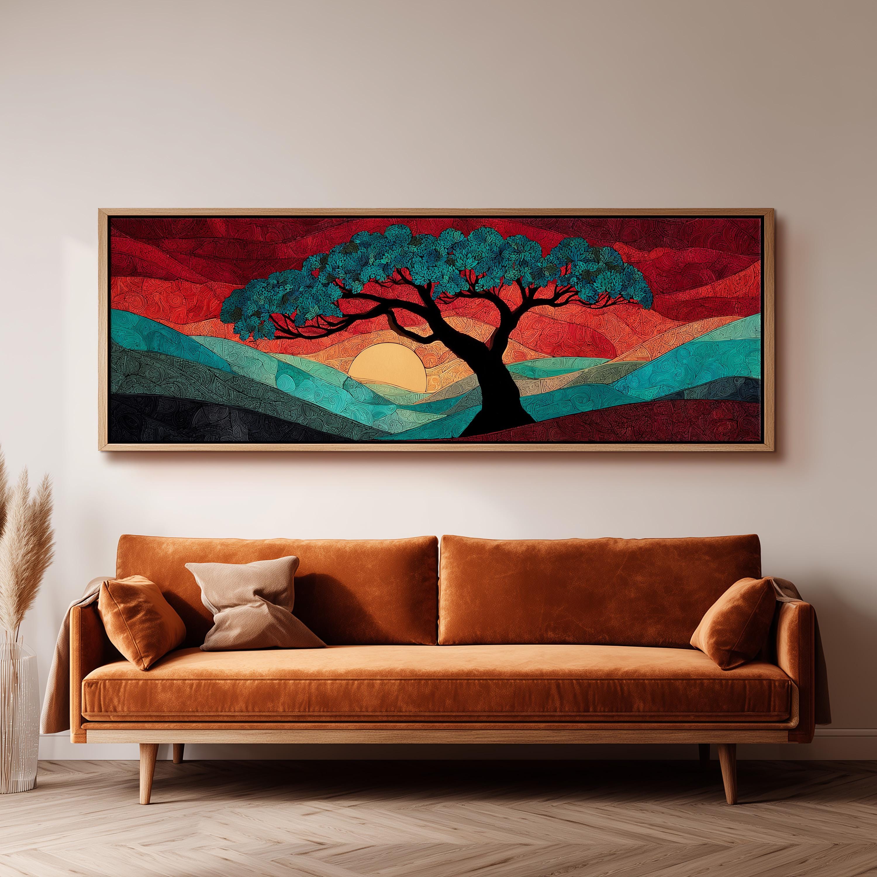 a large, colorful painting of a tree with a sunset in the background, hanging on a wall above a brown sofa.